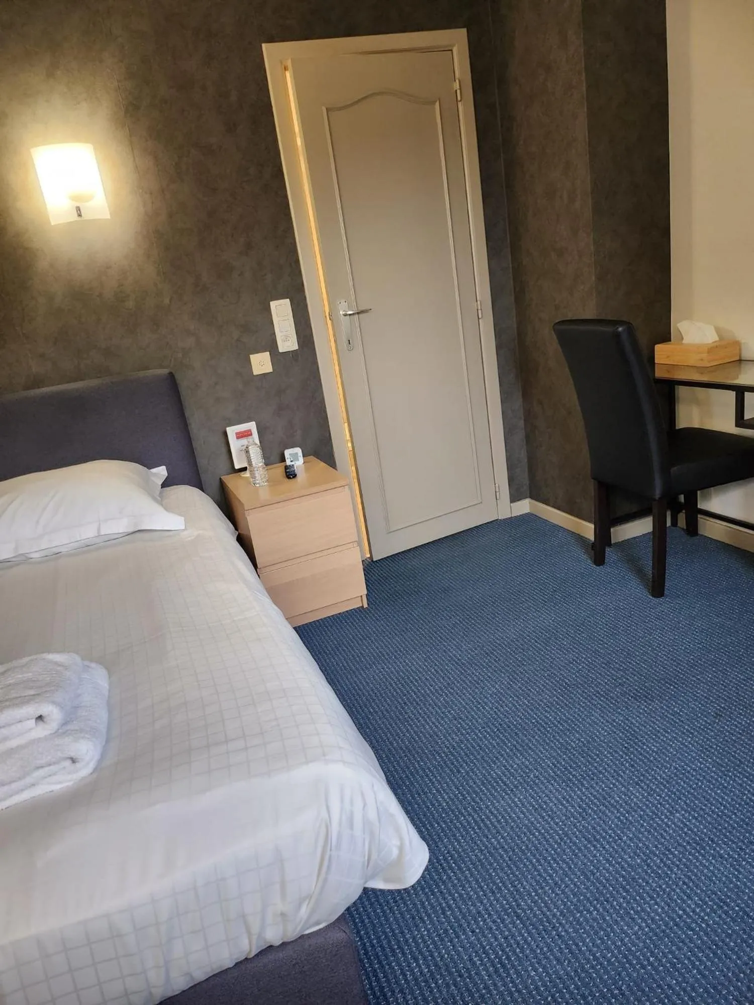 Bed in Hôtel Francorchamps Pitlane Lodge