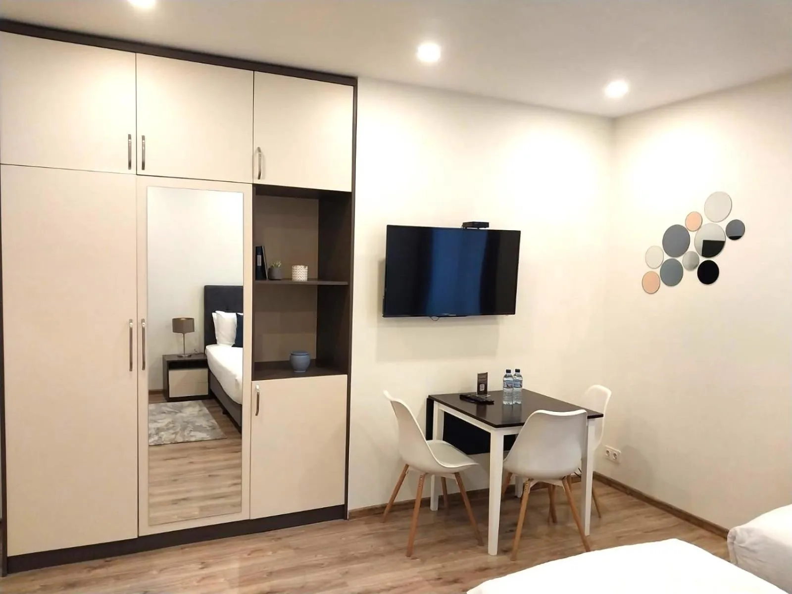 Bed in Bellevue Residence Suites