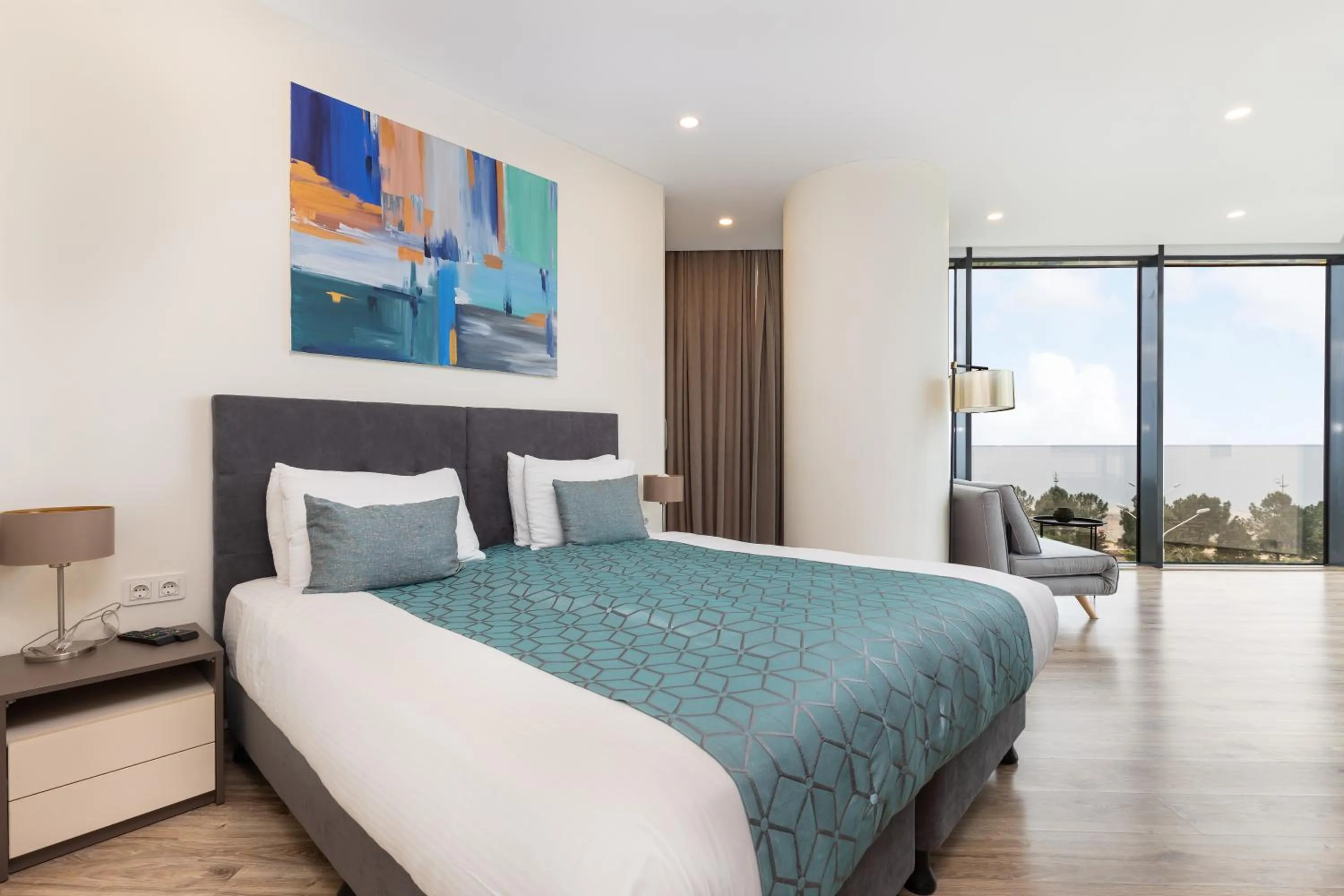 Bed in Bellevue Residence Suites