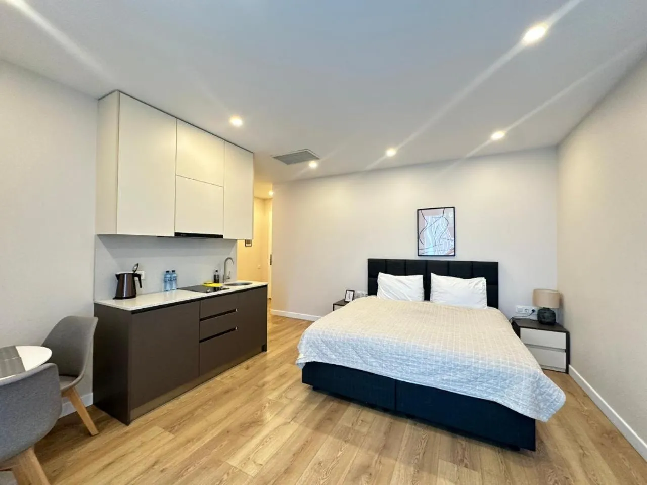 Bed in Bellevue Residence Suites