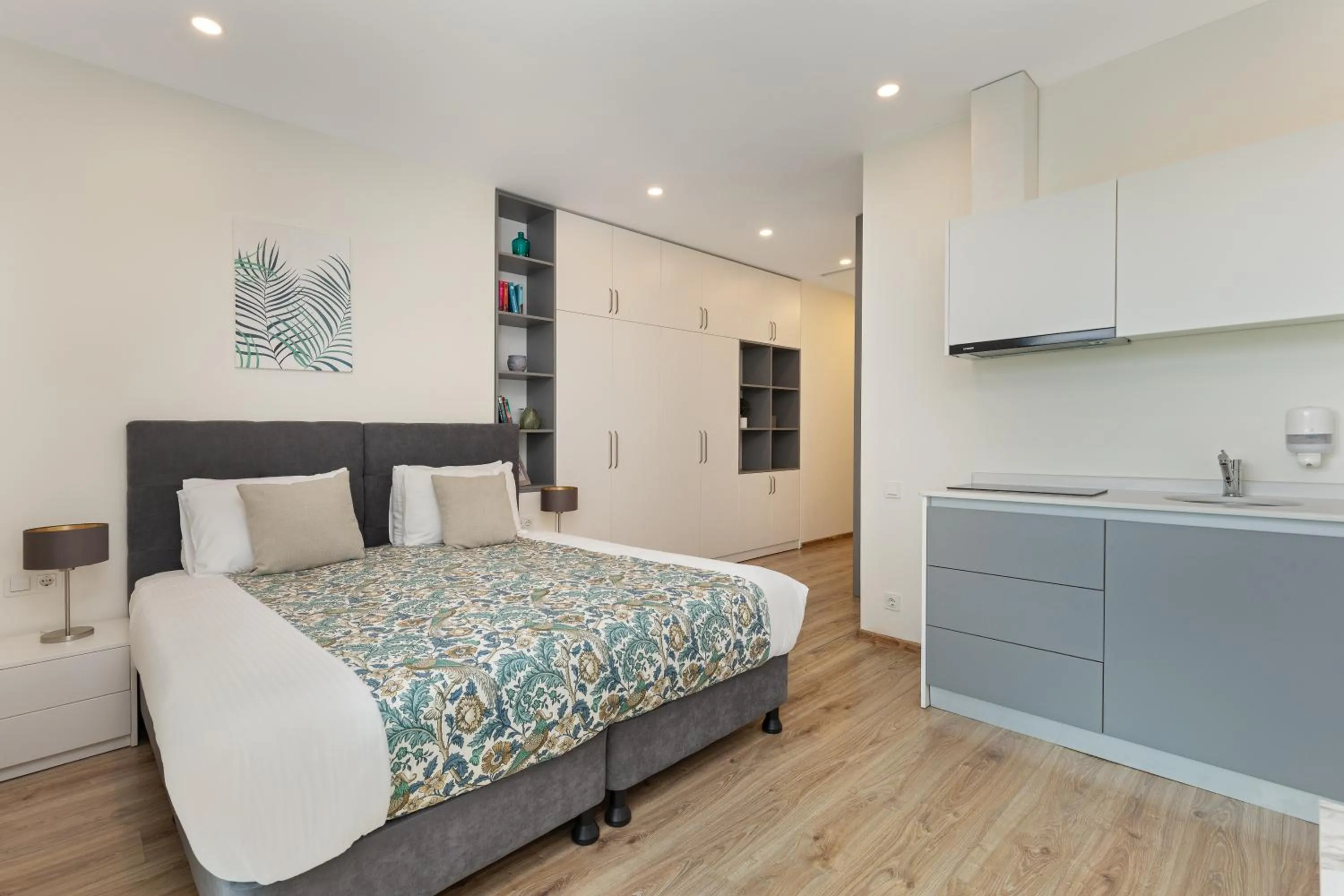 Bed in Bellevue Residence Suites