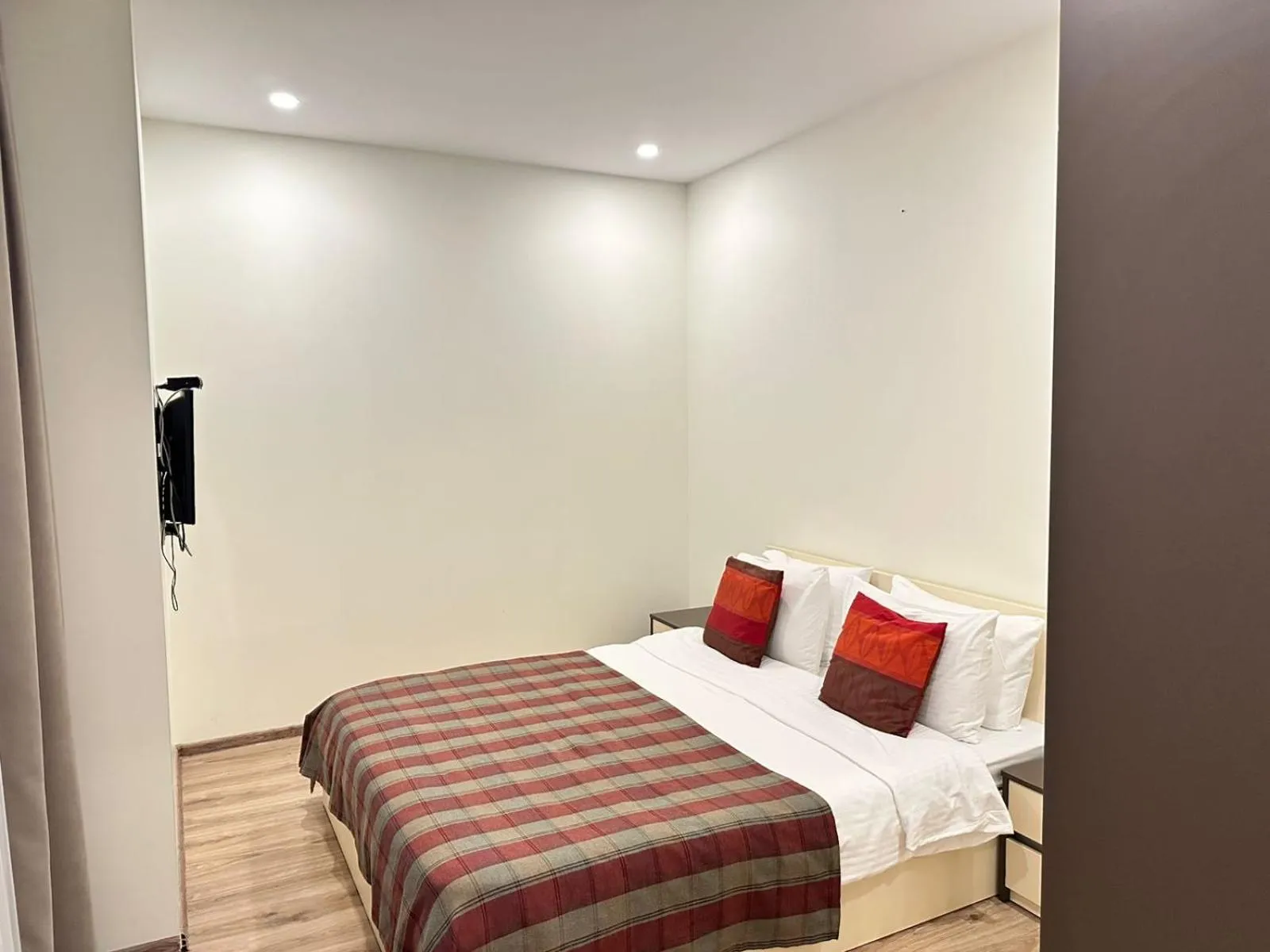 Bed in Bellevue Residence Suites