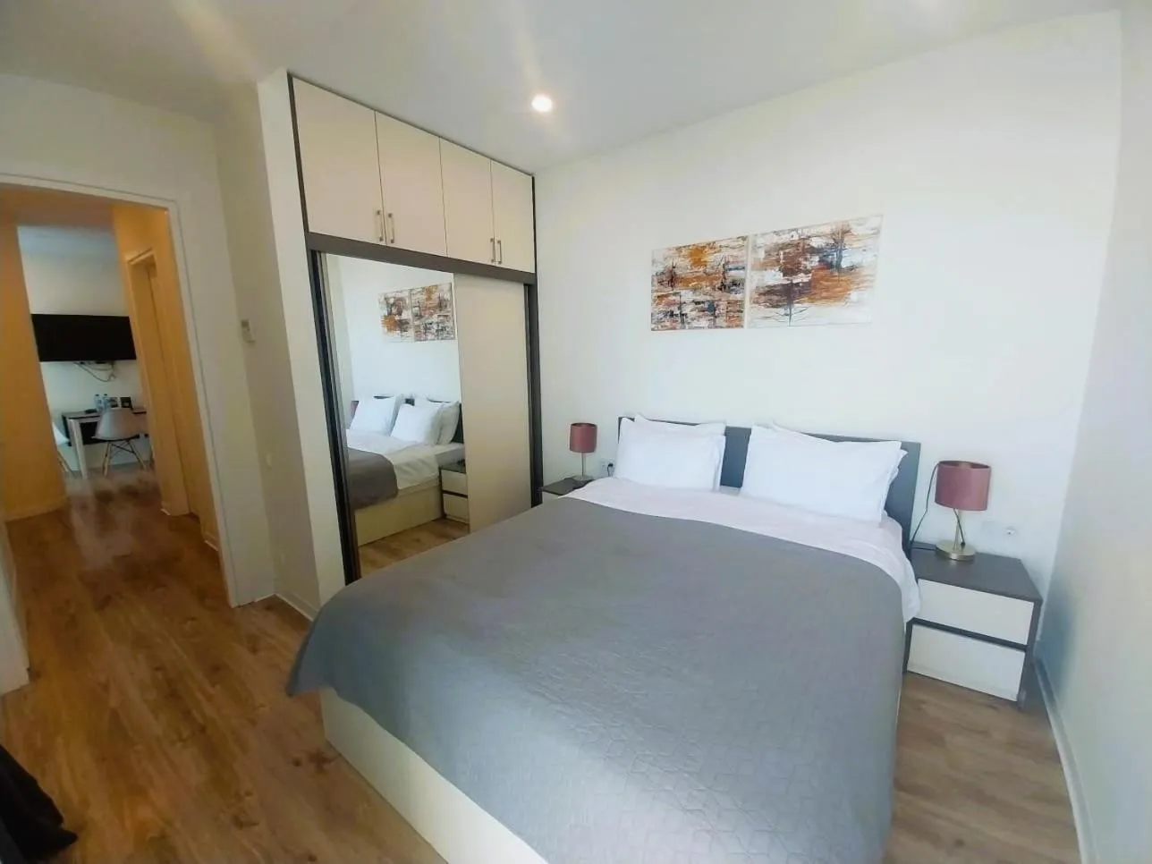 Bed in Bellevue Residence Suites