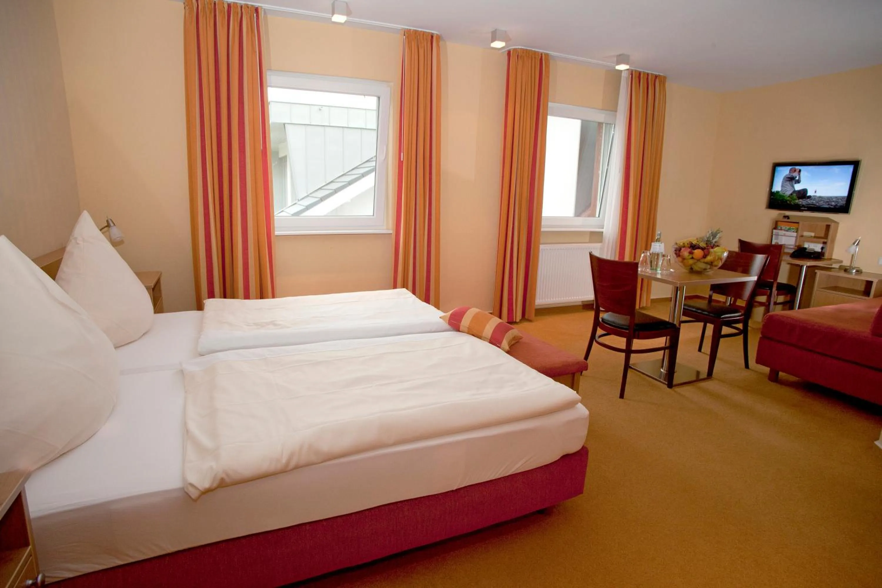Photo of the whole room, Bed in Ringhotel Alfsee Piazza