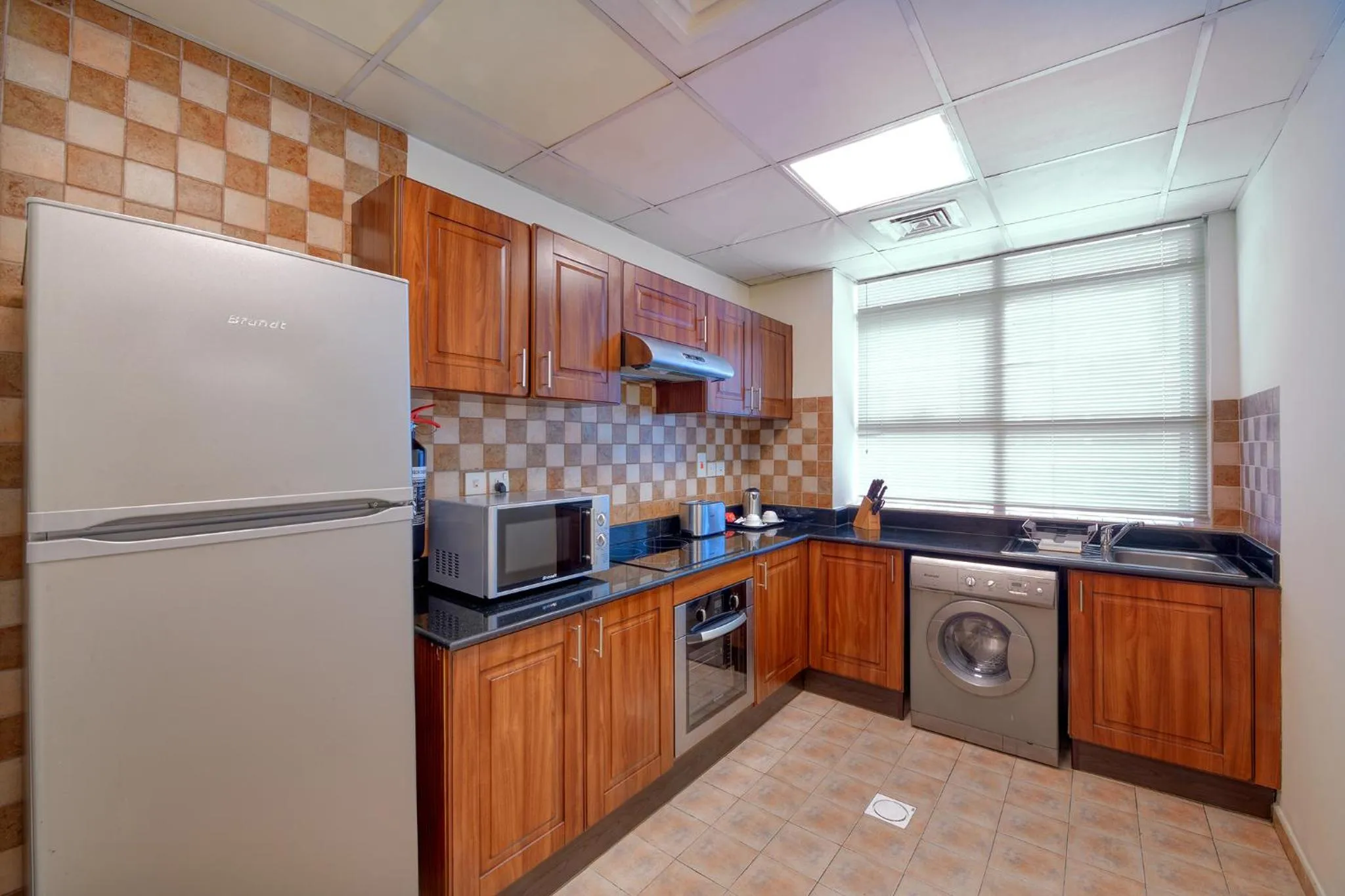 Kitchen or kitchenette in Pearl Marina Hotel Apartments