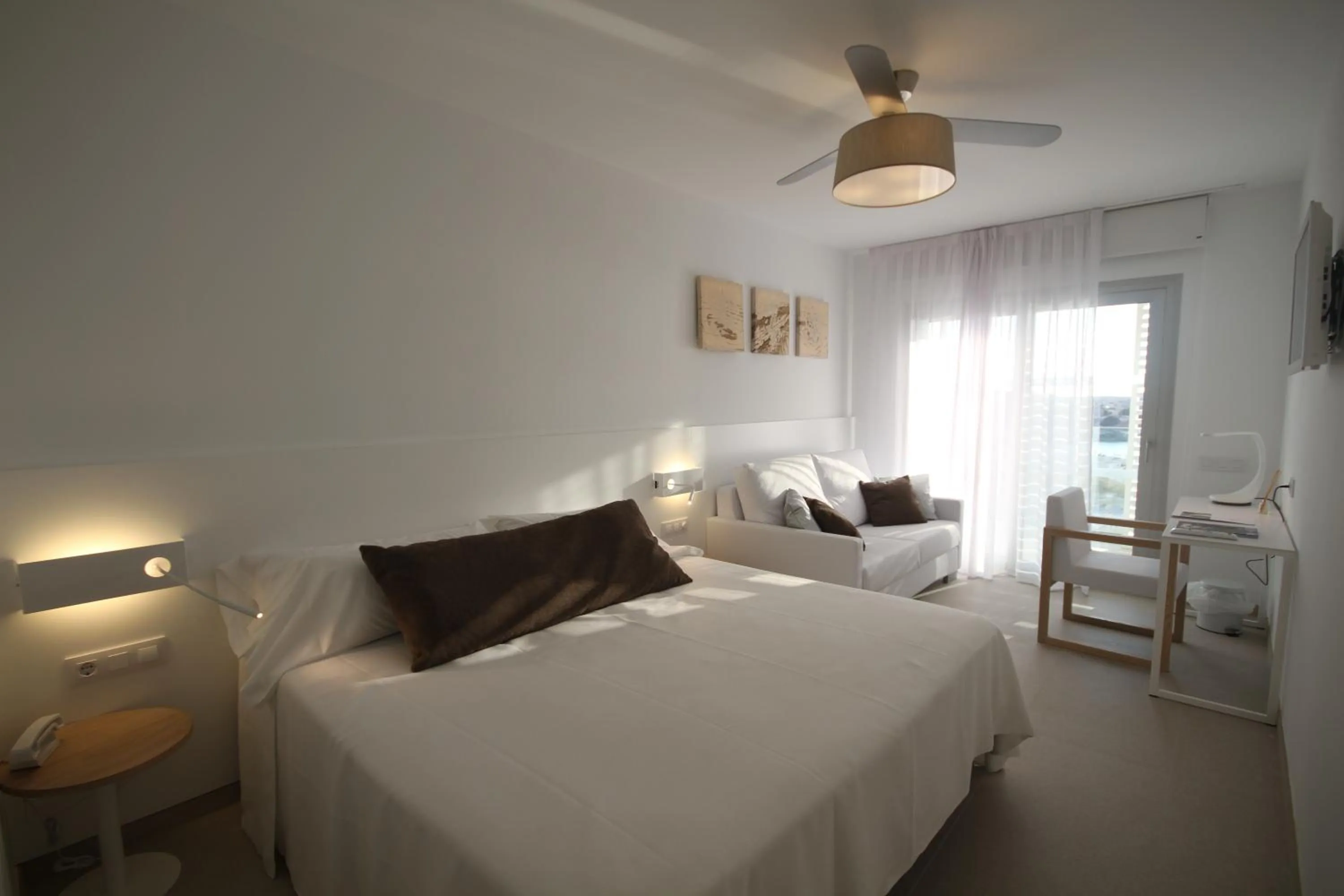 Photo of the whole room, Bed in Hotel Cala Saona & Spa