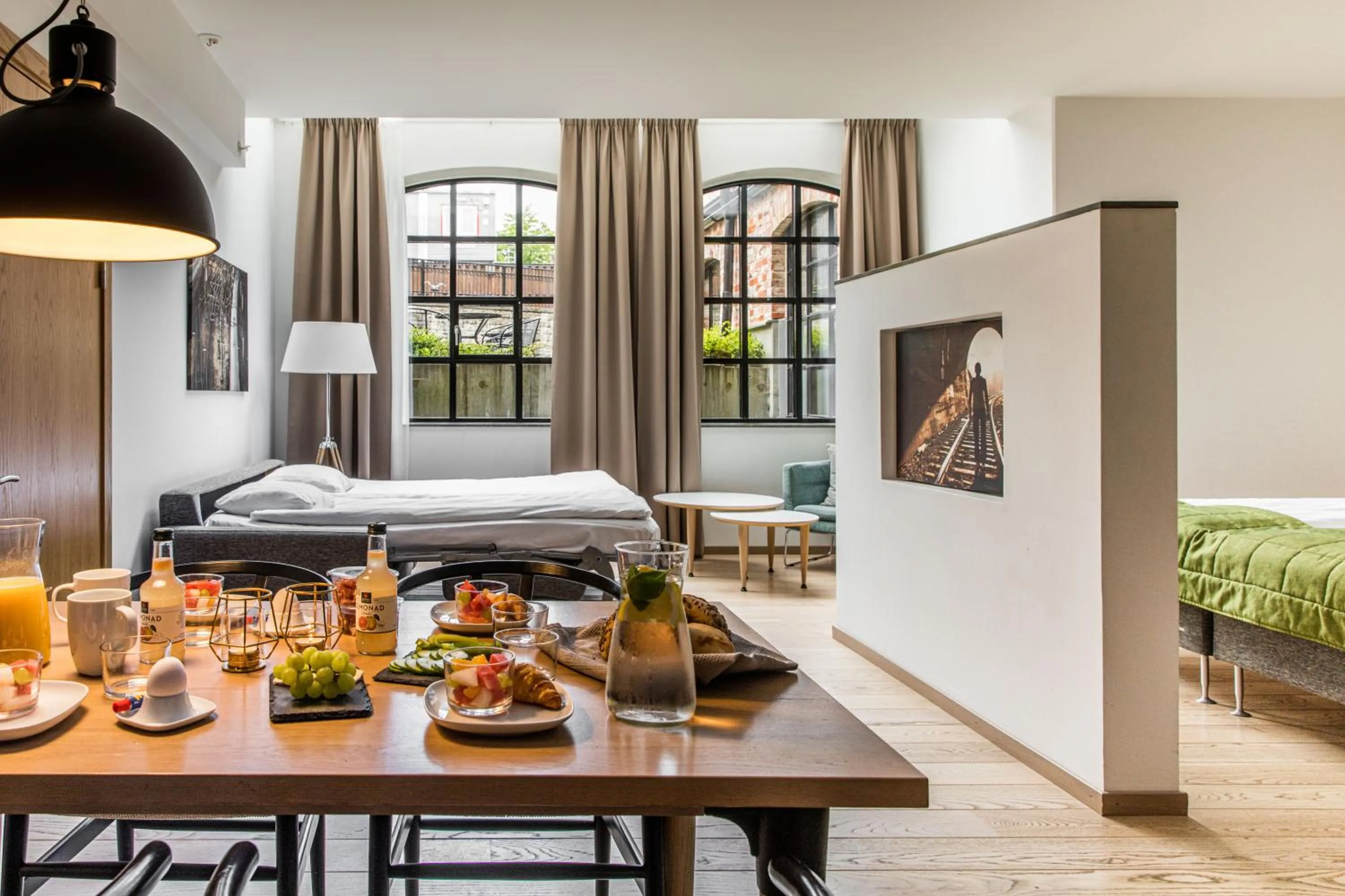 Dining area, Bed in The More Hotel Lund