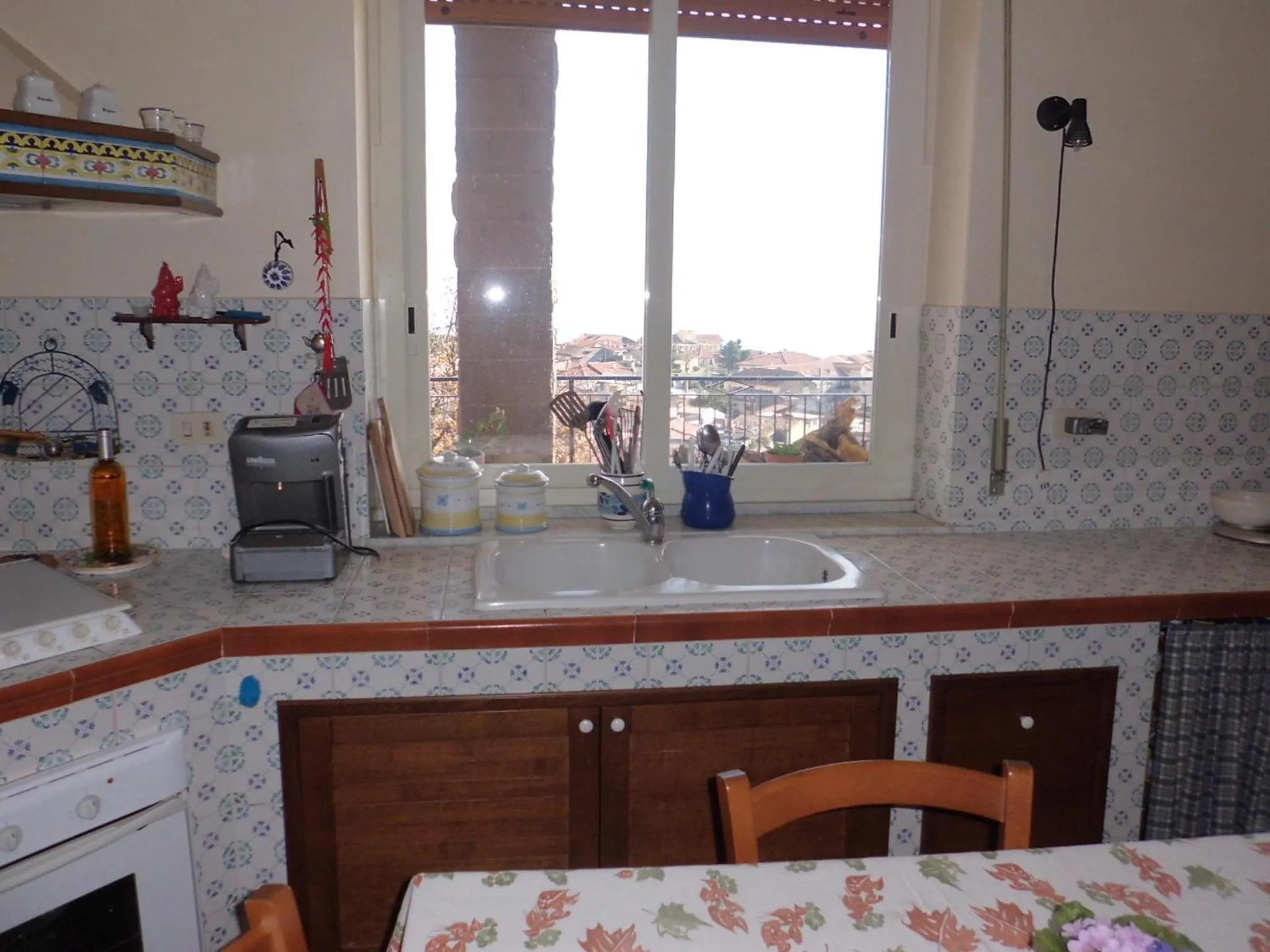 Kitchen or kitchenette in At Armando's Home