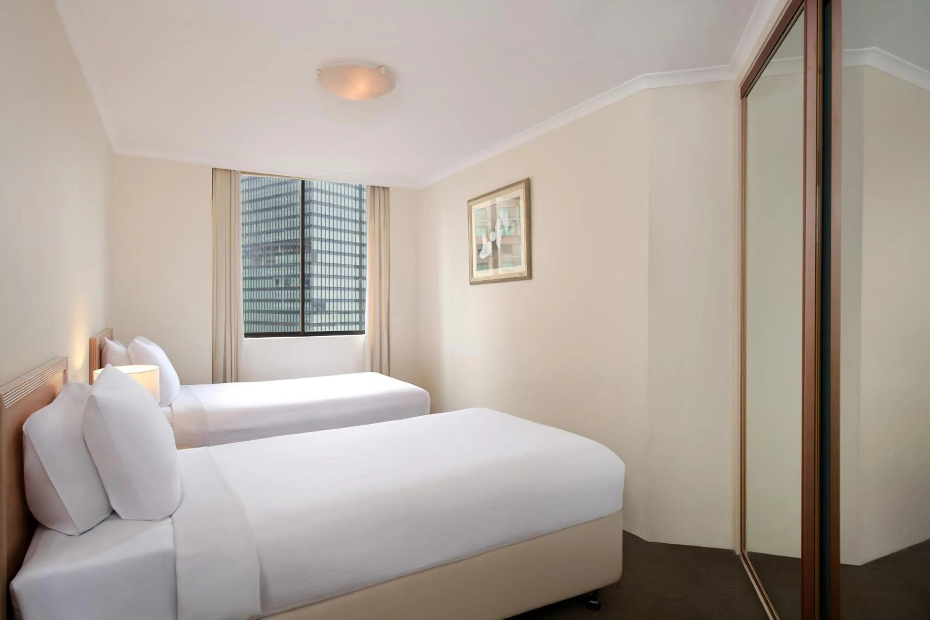 Bed in The York by Swiss-Belhotel