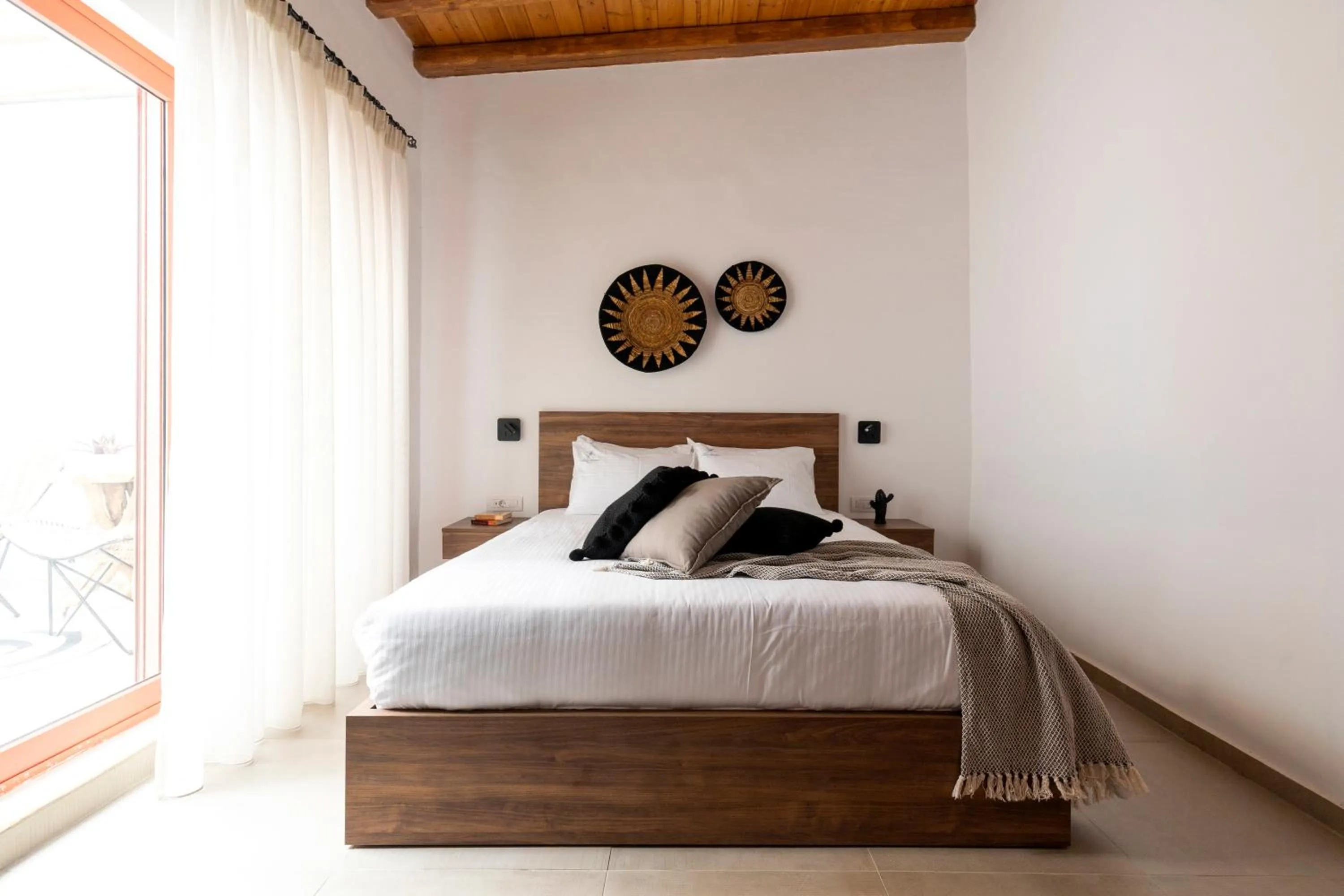 Bedroom in Blue Jasmine Suites