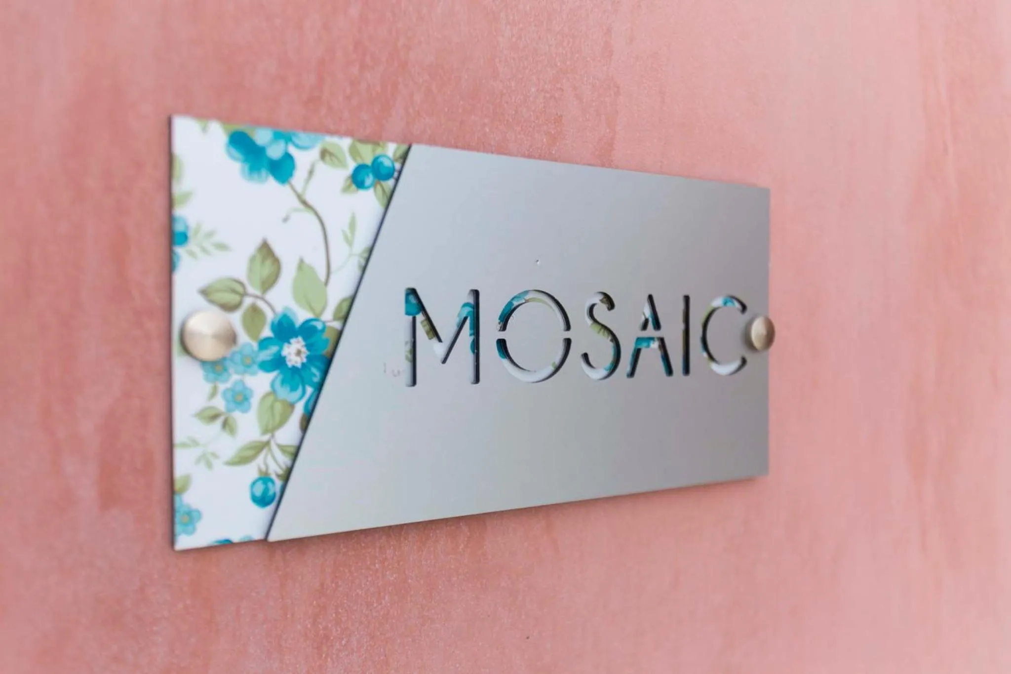 Property logo or sign in Blue Jasmine Suites