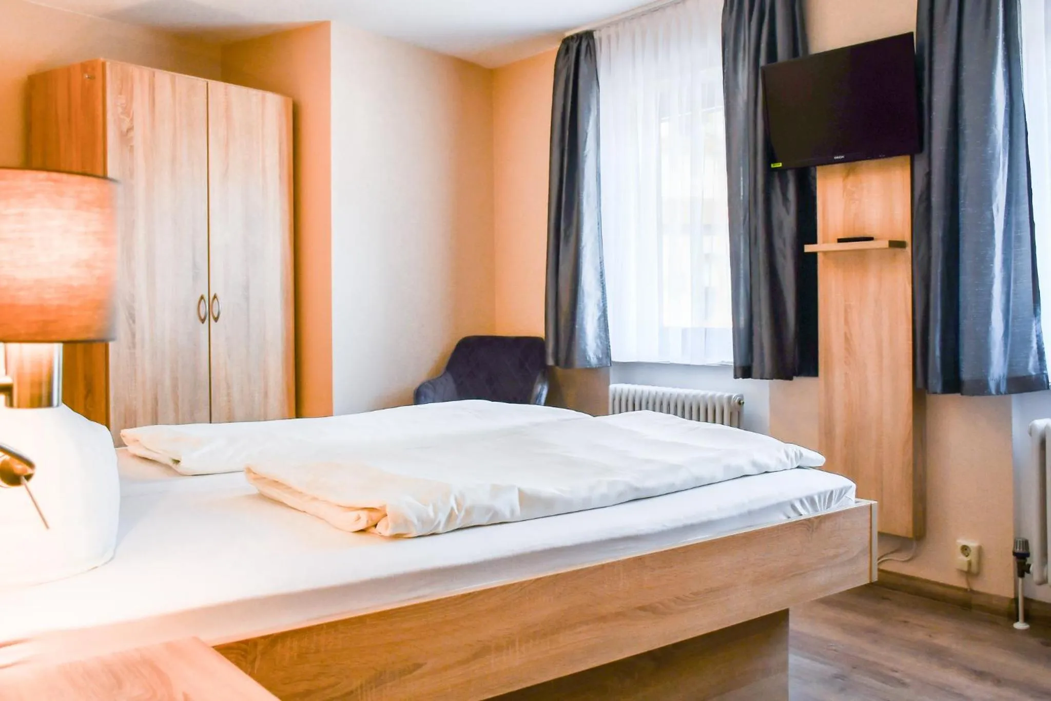 Photo of the whole room, Bed in Kurgarten-Hotel