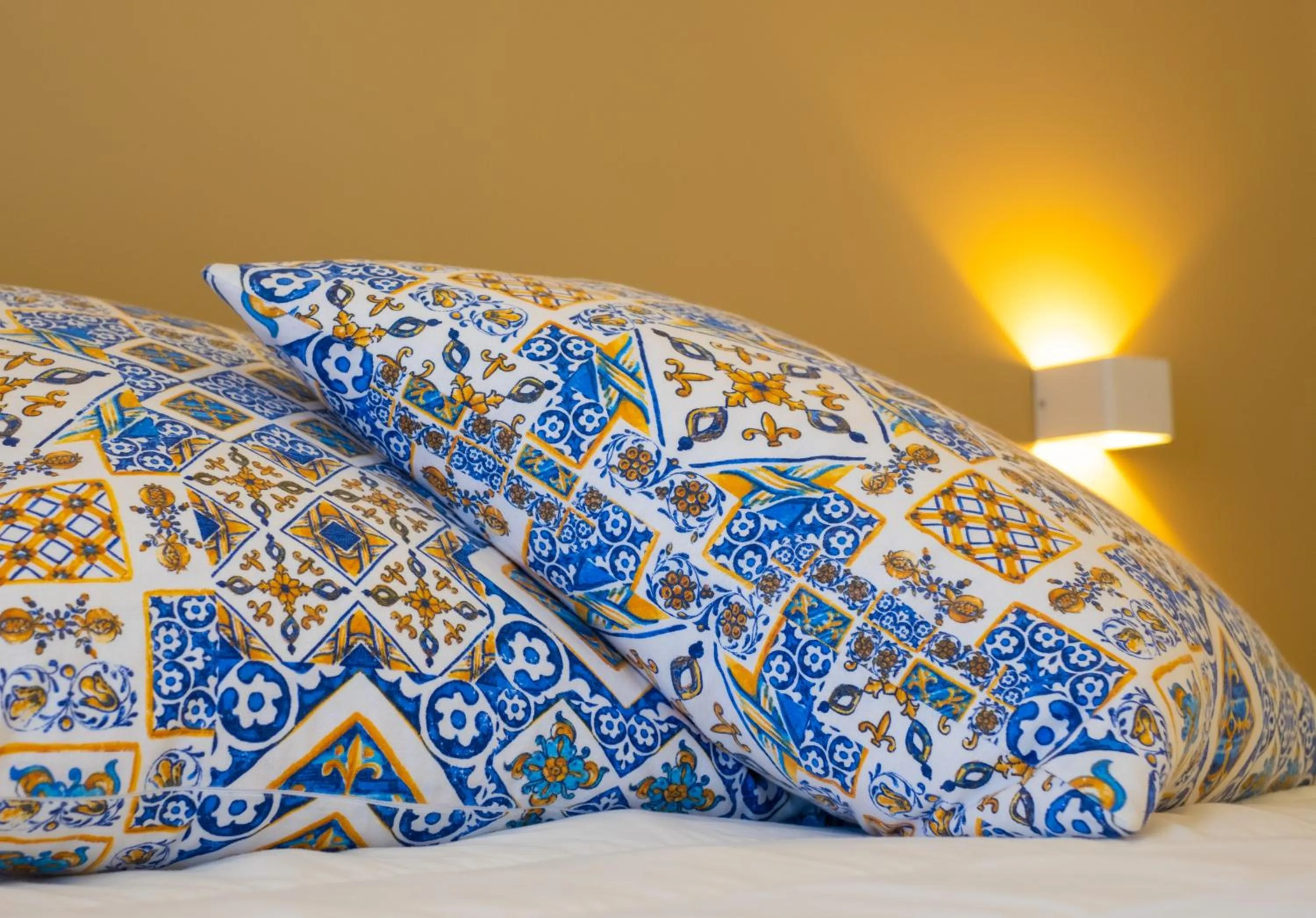 Bed in Taormina Bedda Rooms