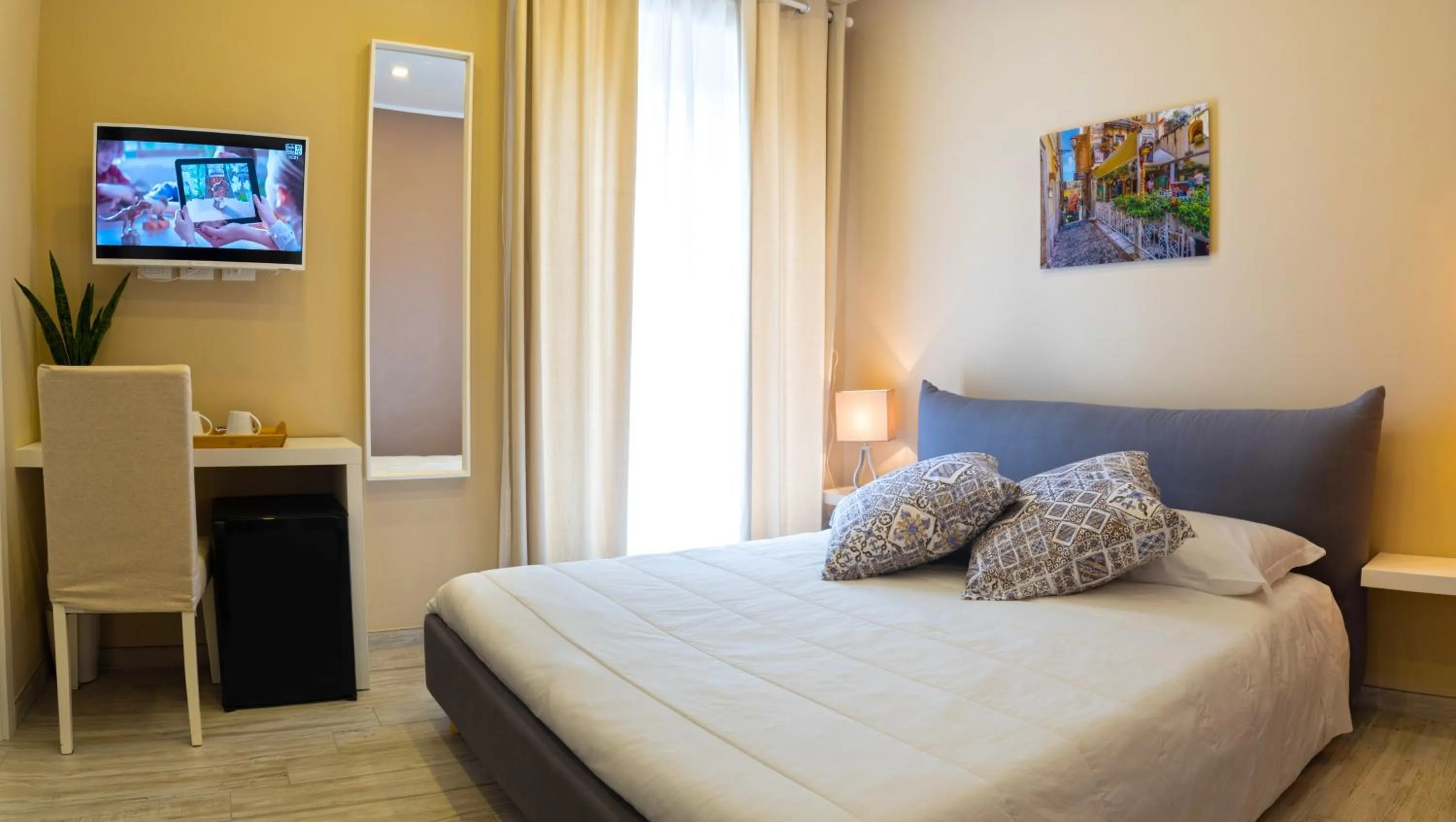 Bed in Taormina Bedda Rooms