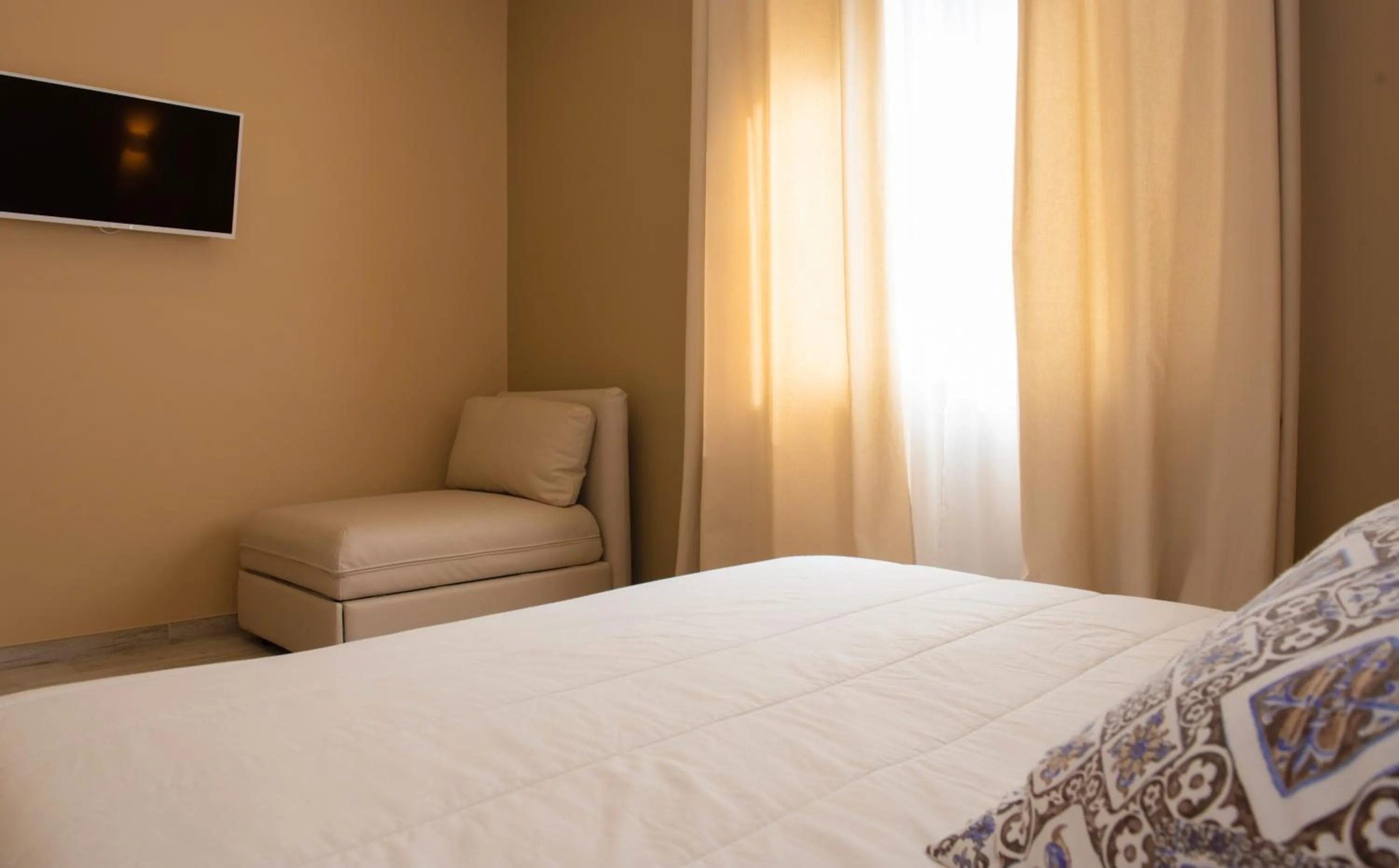 Bed in Taormina Bedda Rooms