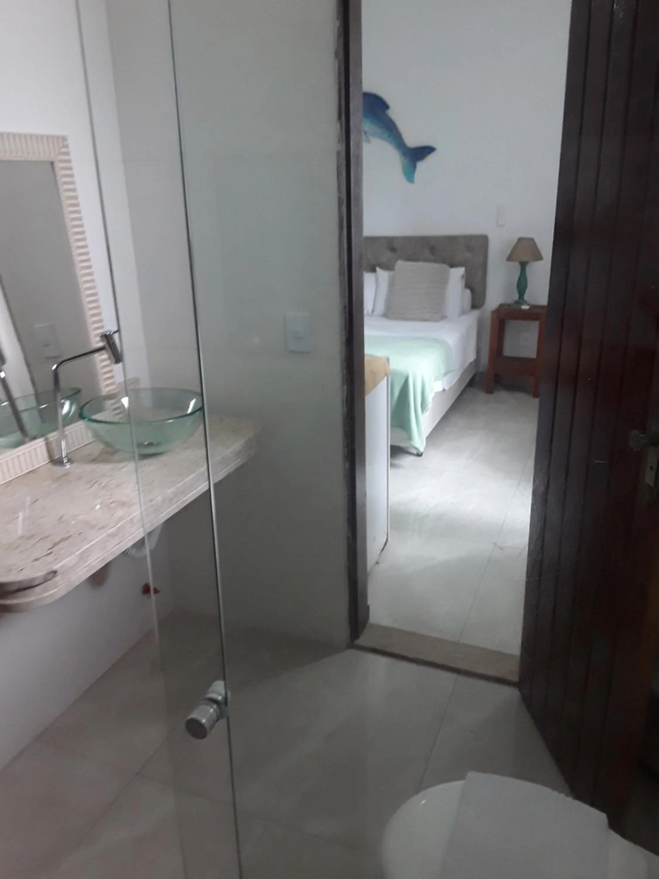 Bed in Pousada Sereia de Geriba