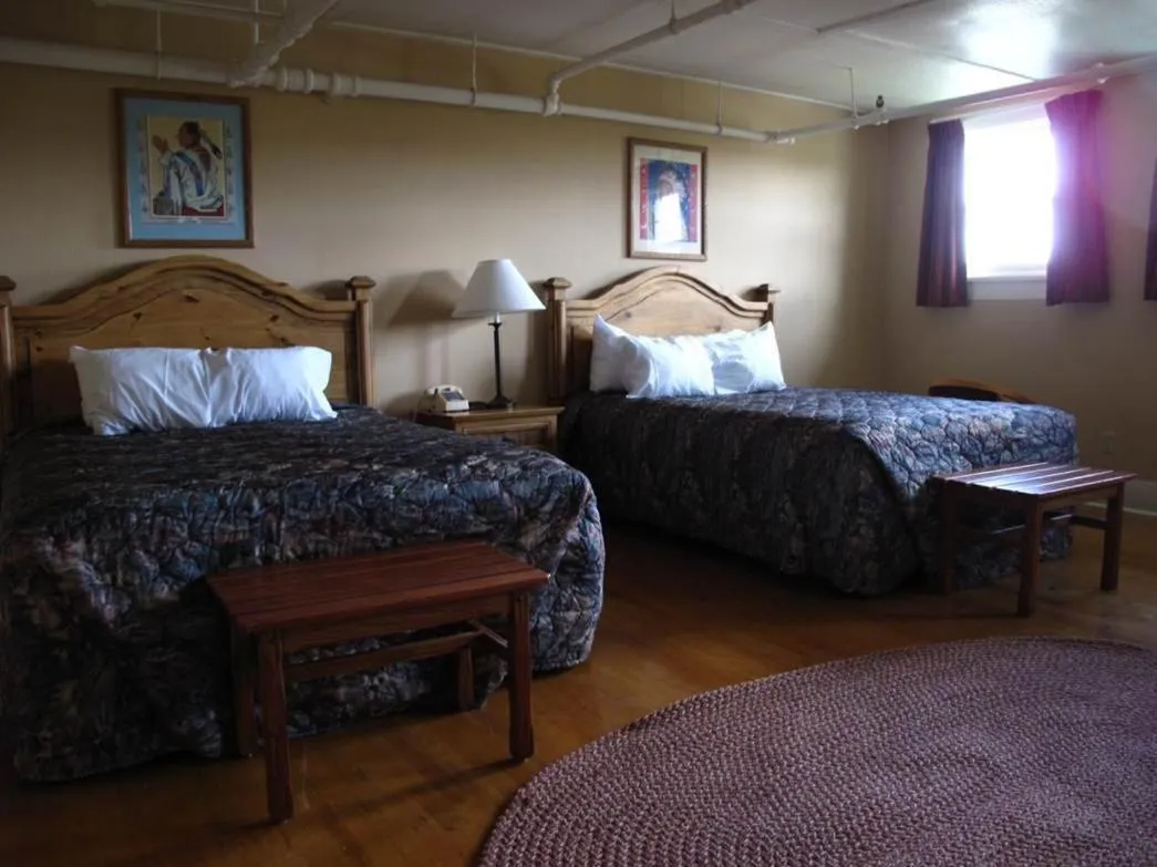 Photo of the whole room, Bed in Glacier Park Lodge