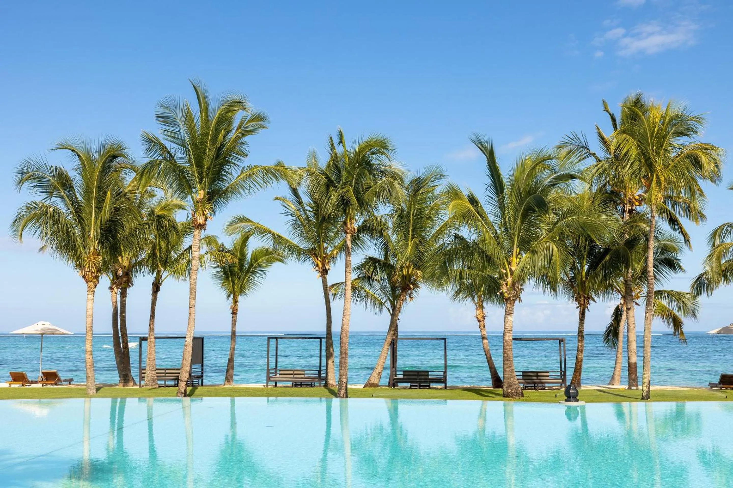 Swimming pool in Dinarobin Beachcomber Golf Resort & Spa