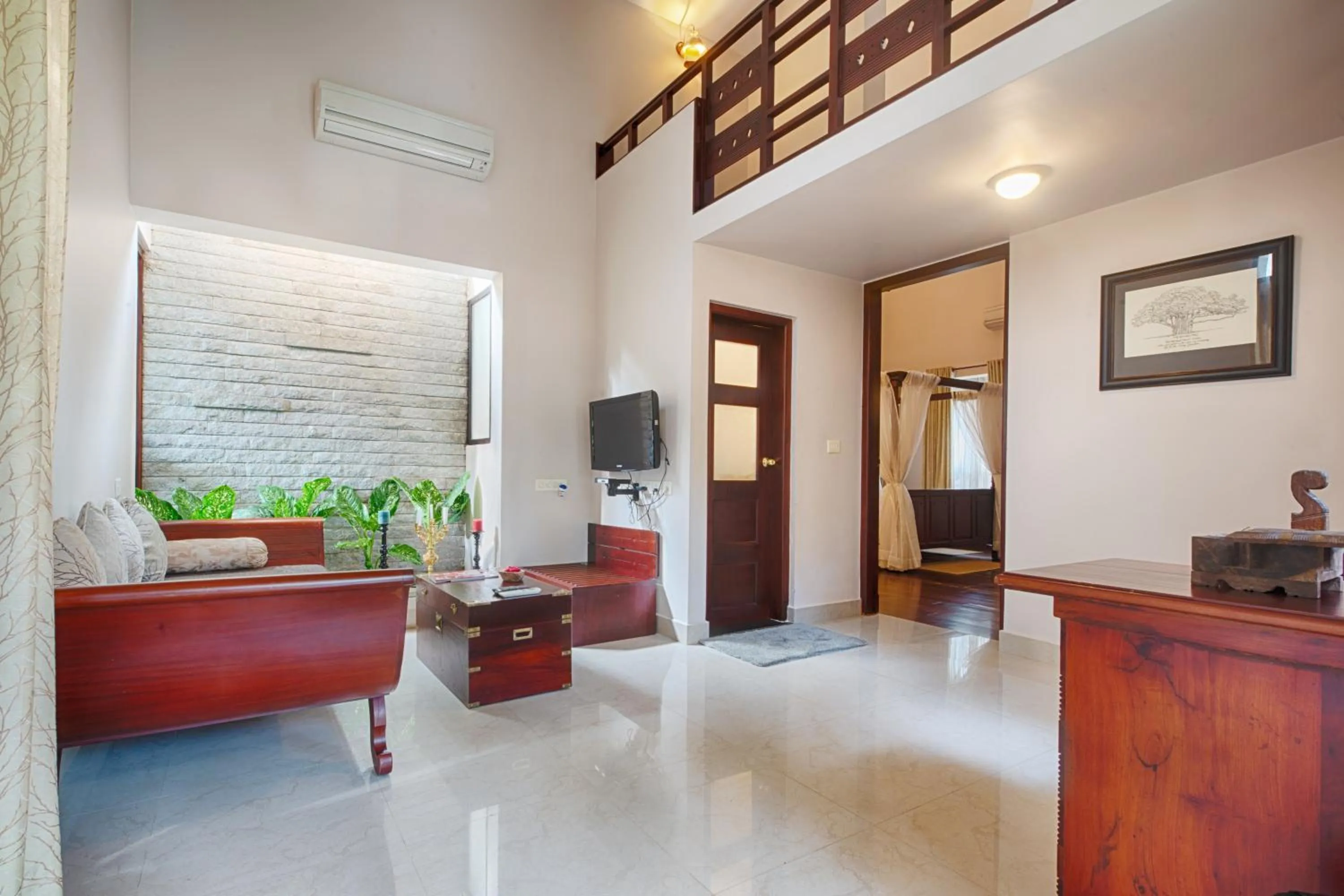 Living room in Greenwoods Resort, Thekkady