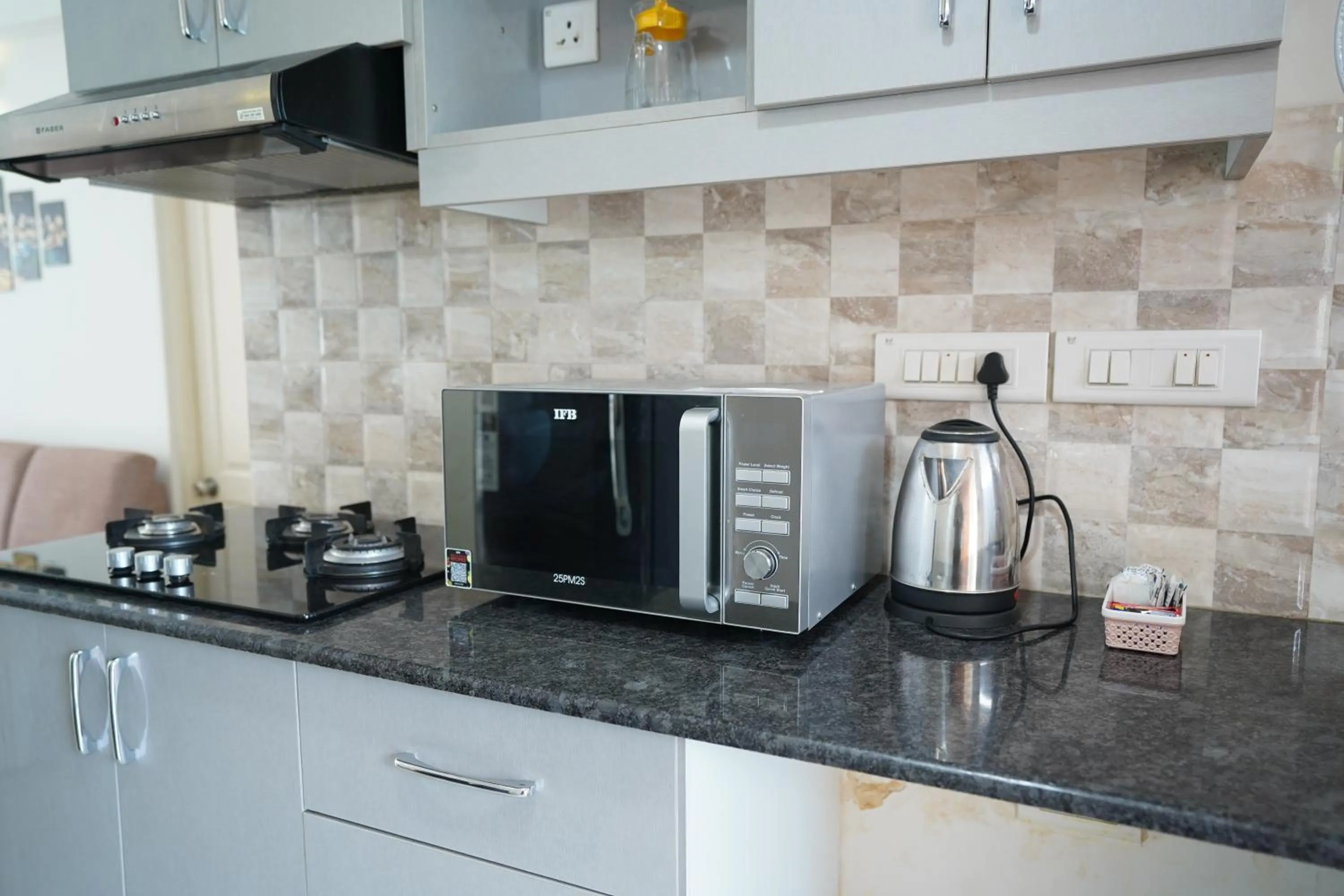 kitchen in Bellagio Rezidencia 1 BHK Service Apartments