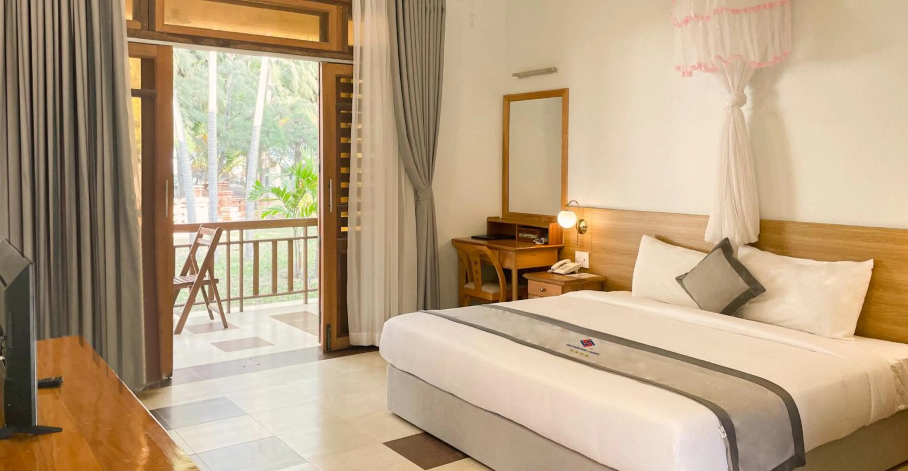 Bed in Long Thuan Hotel & Resort