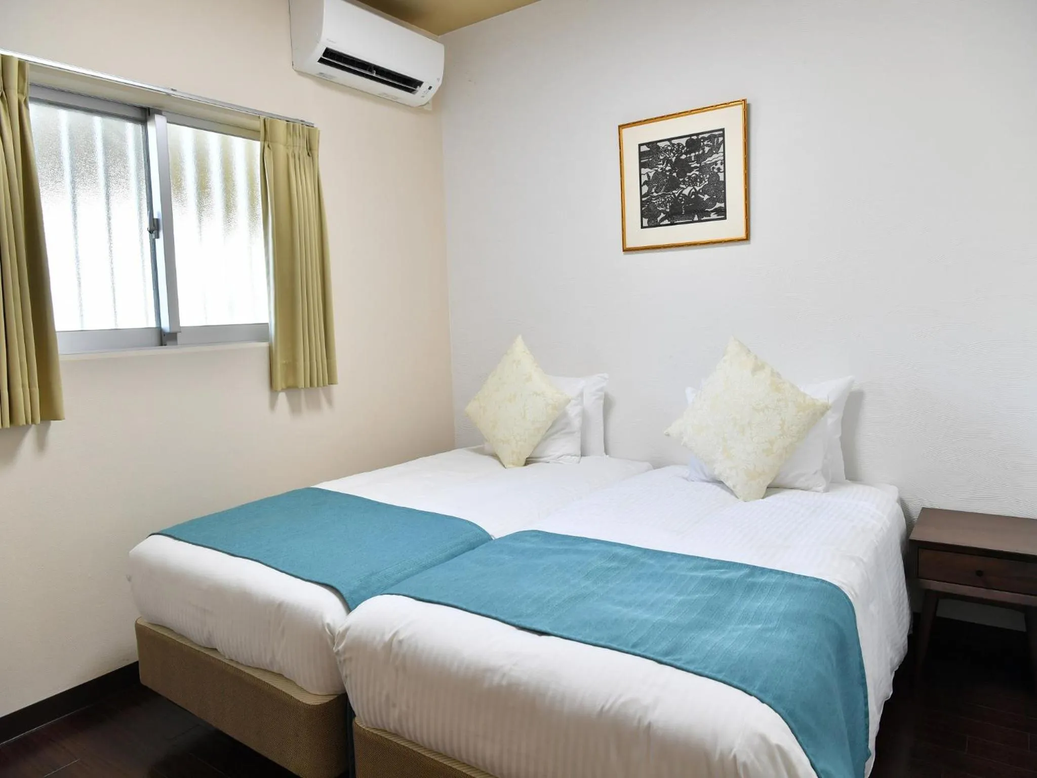 Bedroom, Bed in Churaumi on the Beach Motobu