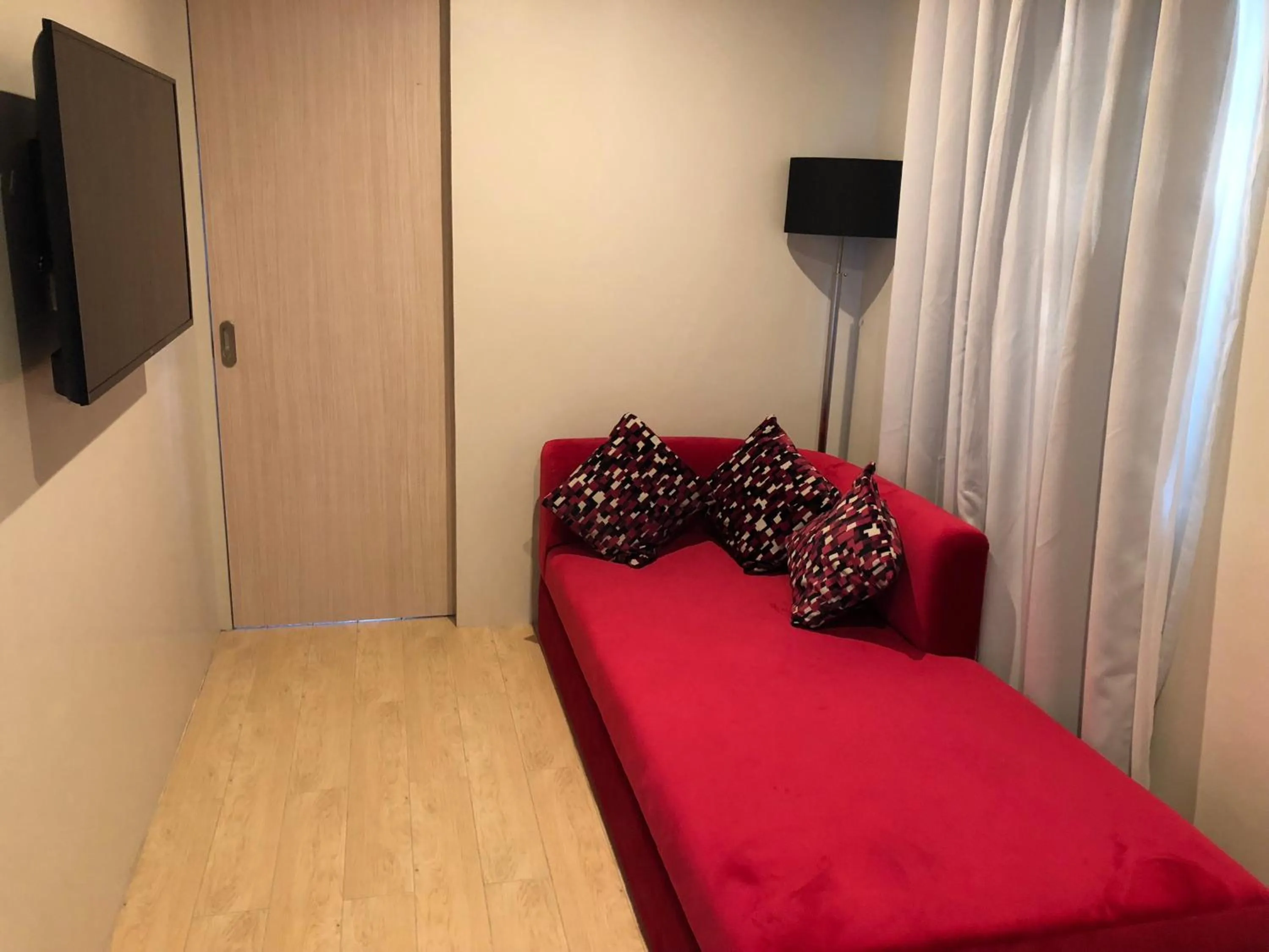 Living room, Bed in The Madeline Boutique Hotel & Suites