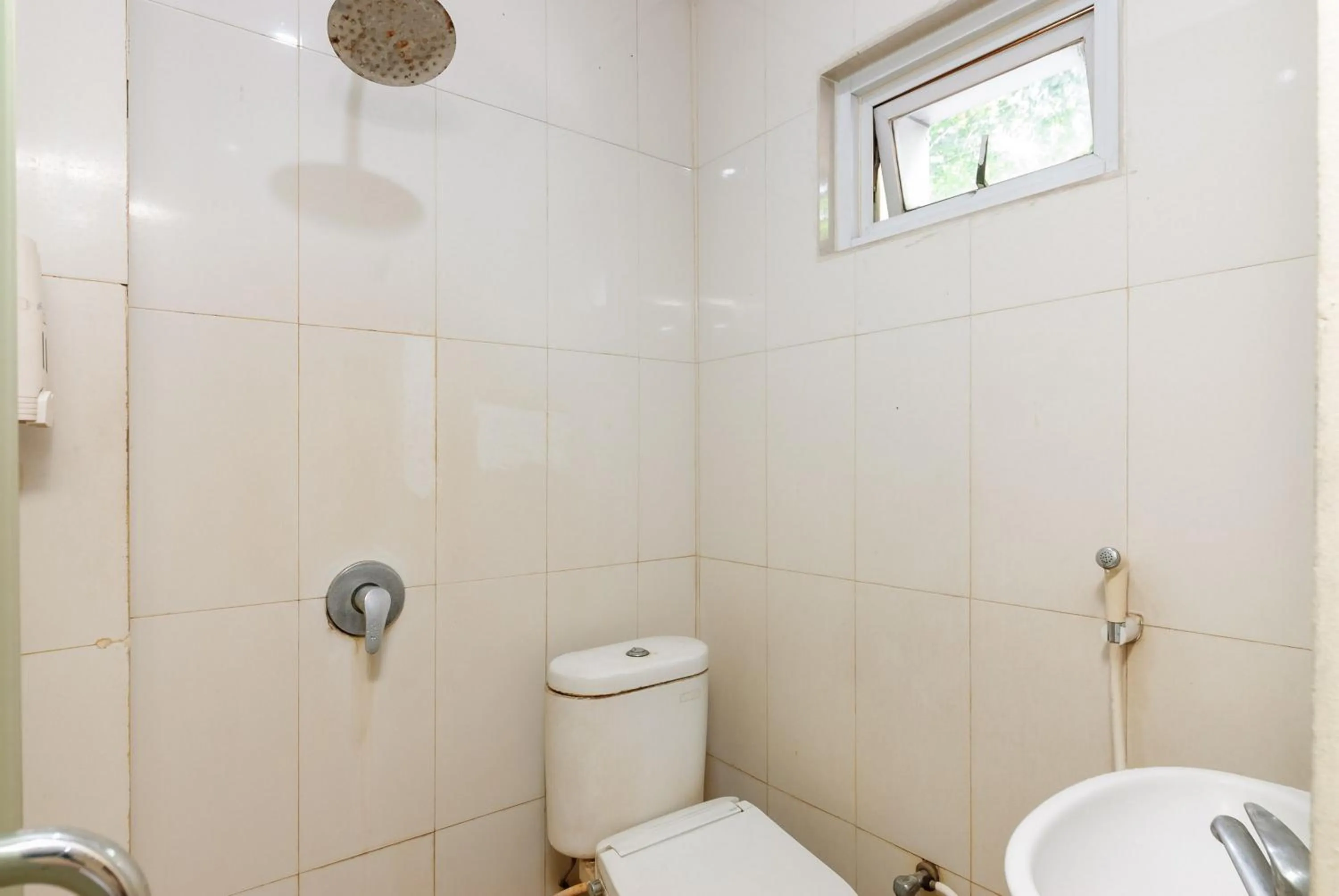 Bathroom in RedDoorz Plus @ Jalan Pemuda Jakarta