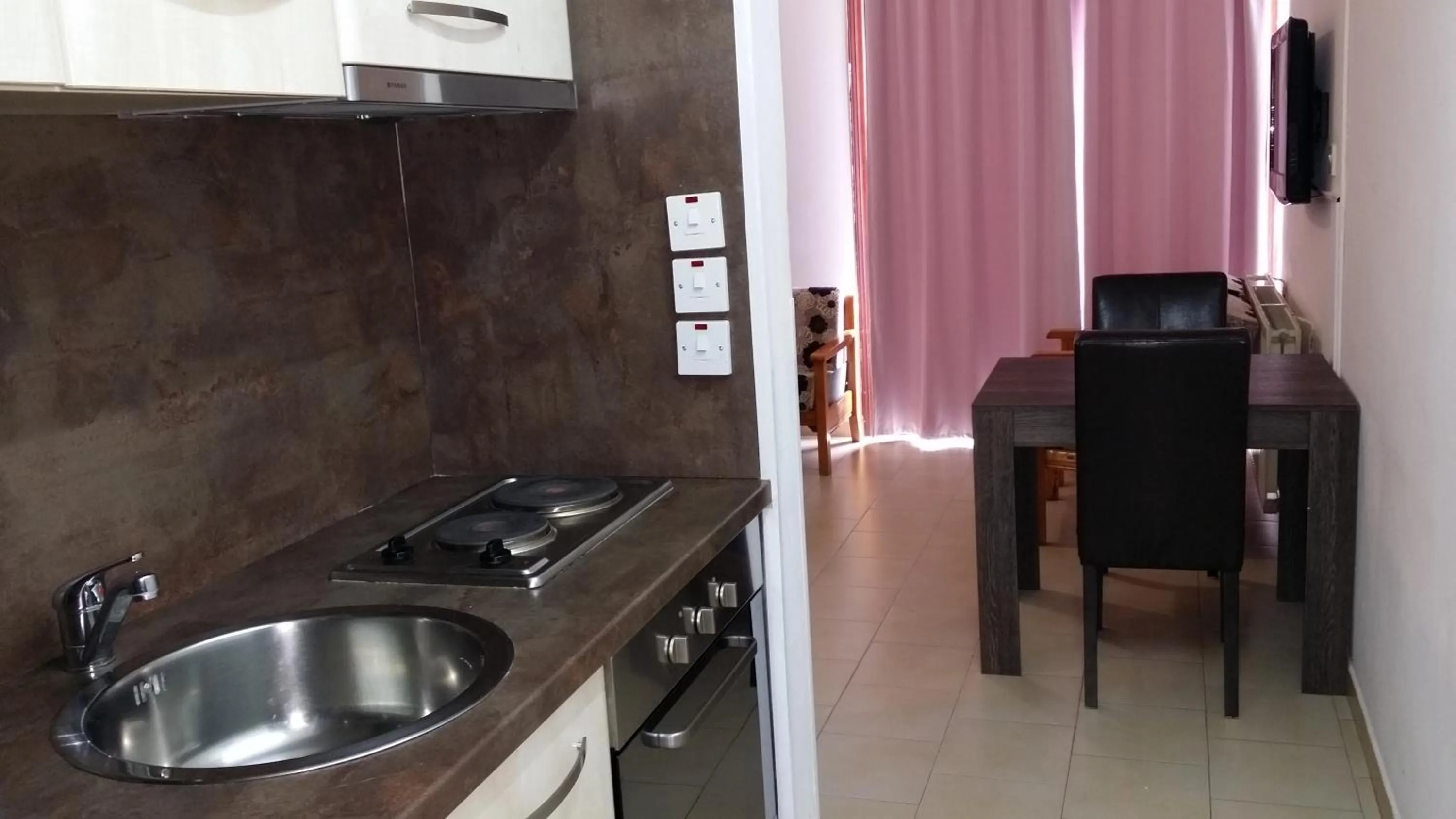 Kitchen or kitchenette in Agrino Hotel Apartments