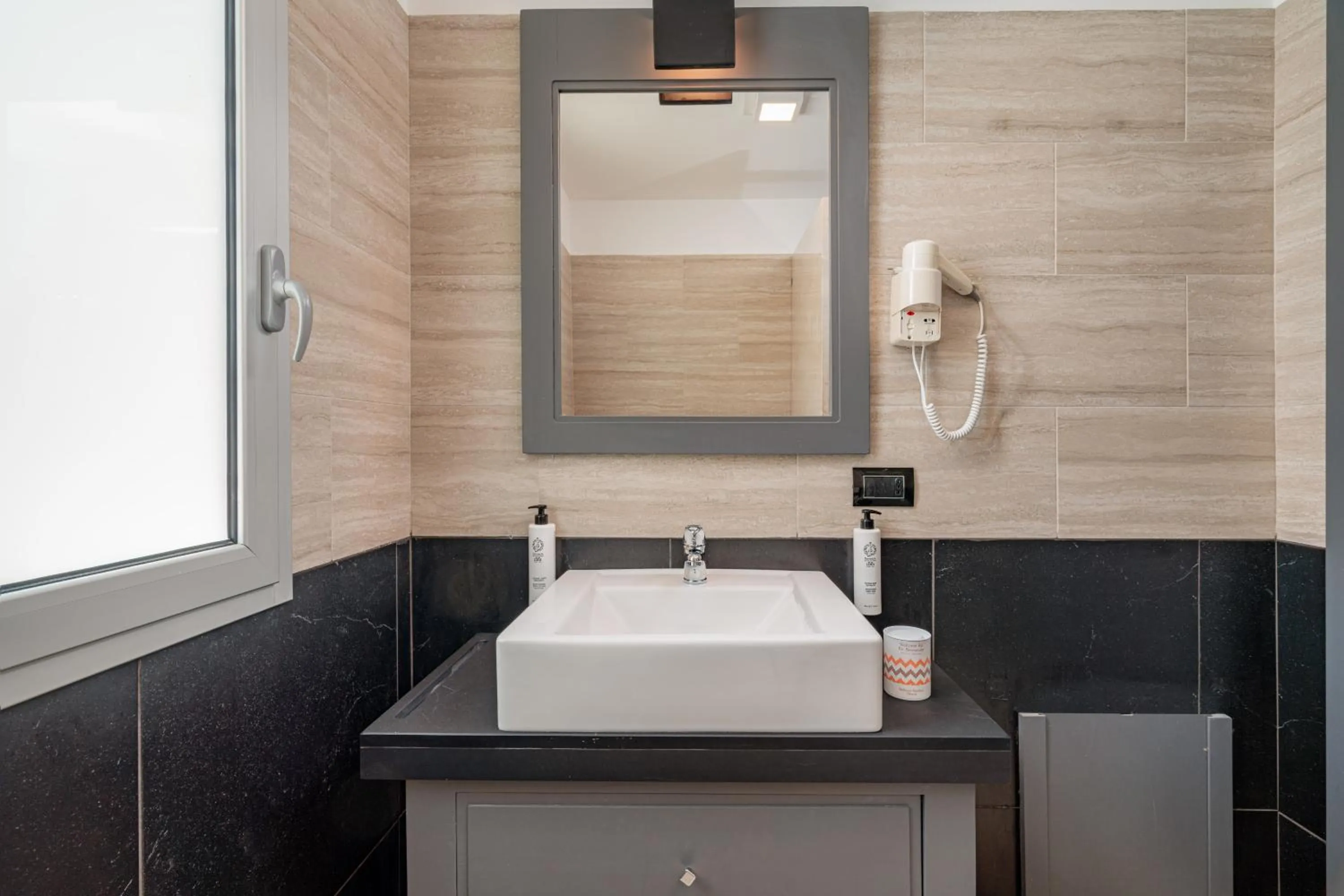 Bathroom in Bellevue Sardinia Resort Affiliated by Meliá