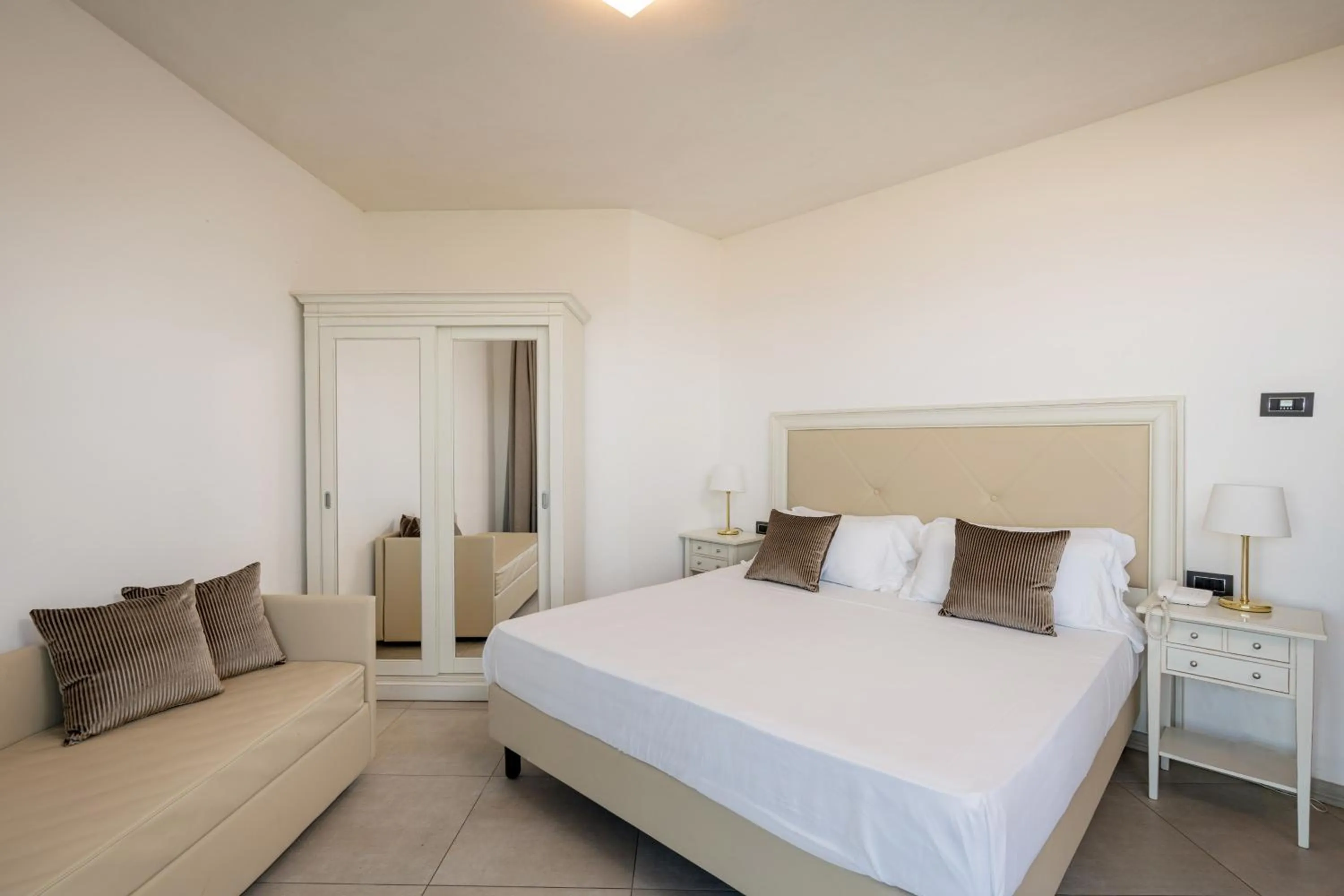 Bed in Bellevue Sardinia Resort Affiliated by Meliá