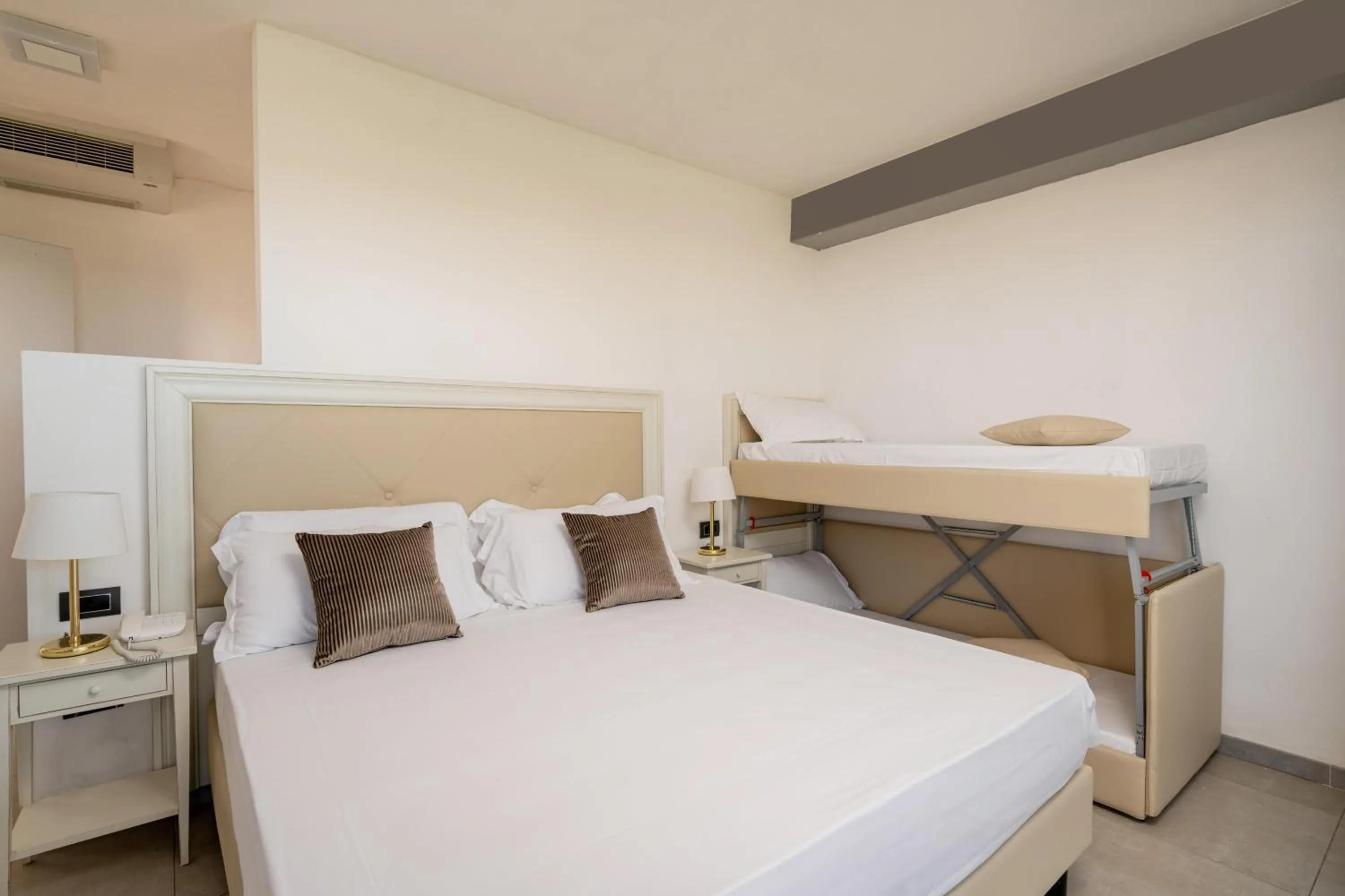 Bed in Bellevue Sardinia Resort Affiliated by Meliá