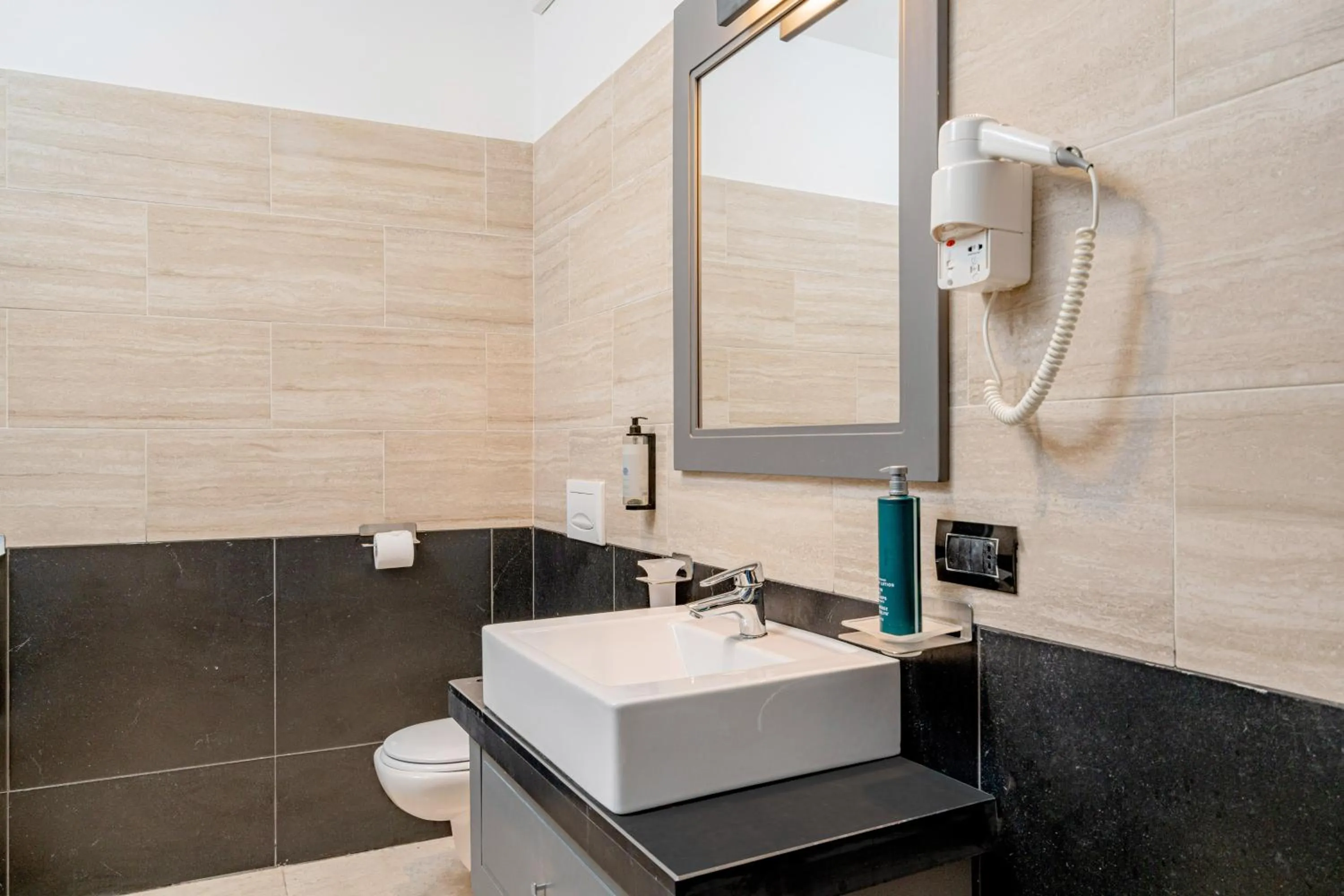 Shower in Bellevue Sardinia Resort Affiliated by Meliá