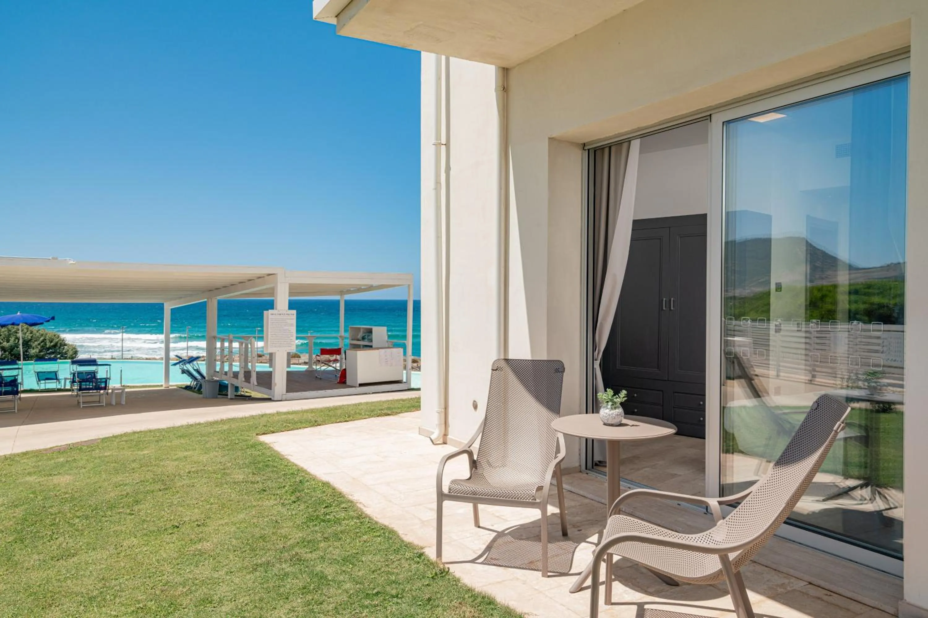 Pool view in Bellevue Sardinia Resort Affiliated by Meliá