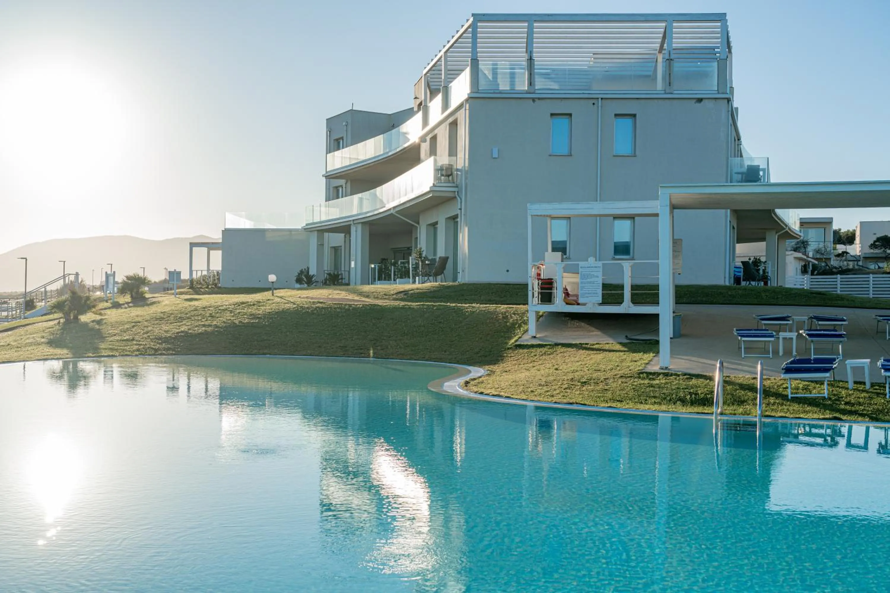Swimming pool in Bellevue Sardinia Resort Affiliated by Meliá
