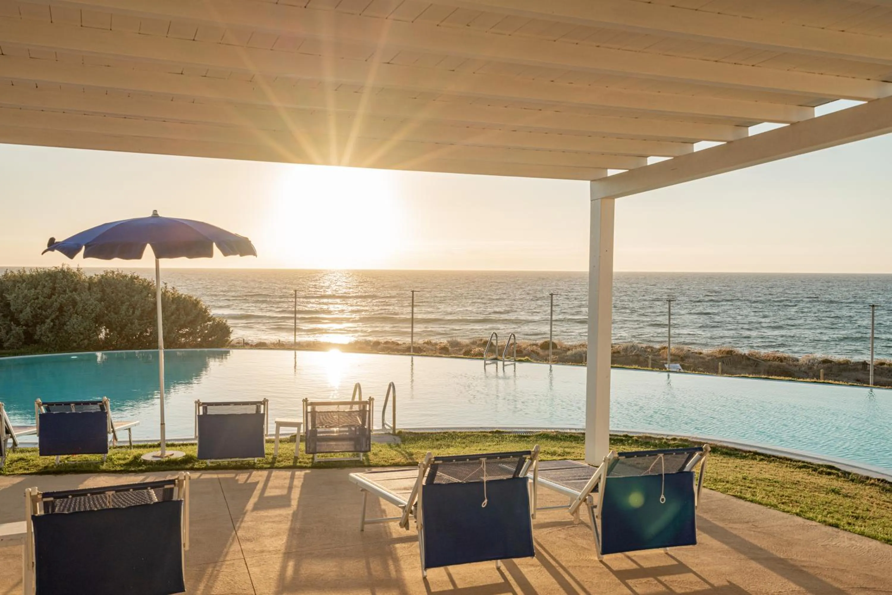 Swimming pool in Bellevue Sardinia Resort Affiliated by Meliá