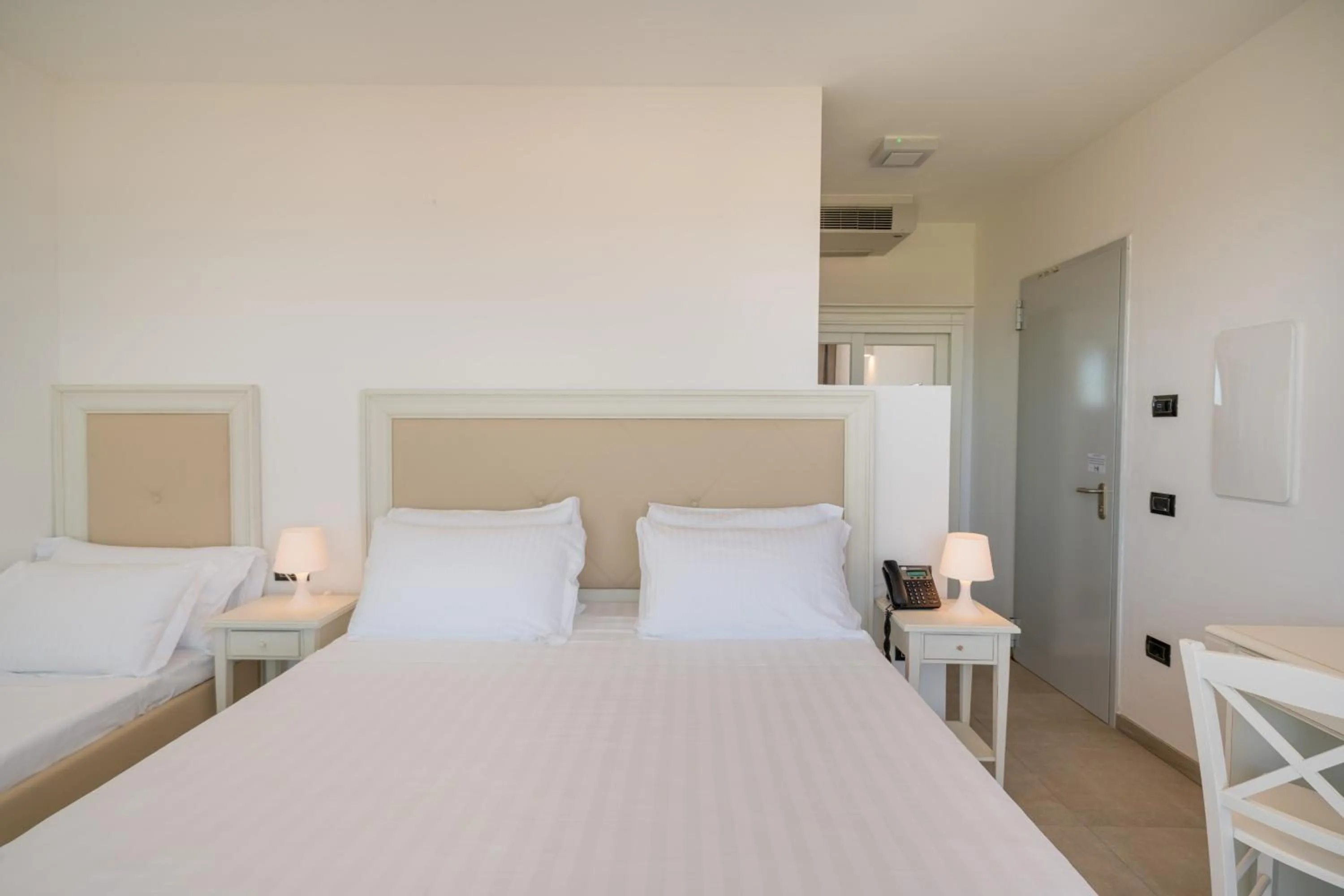 Bed in Bellevue Sardinia Resort Affiliated by Meliá