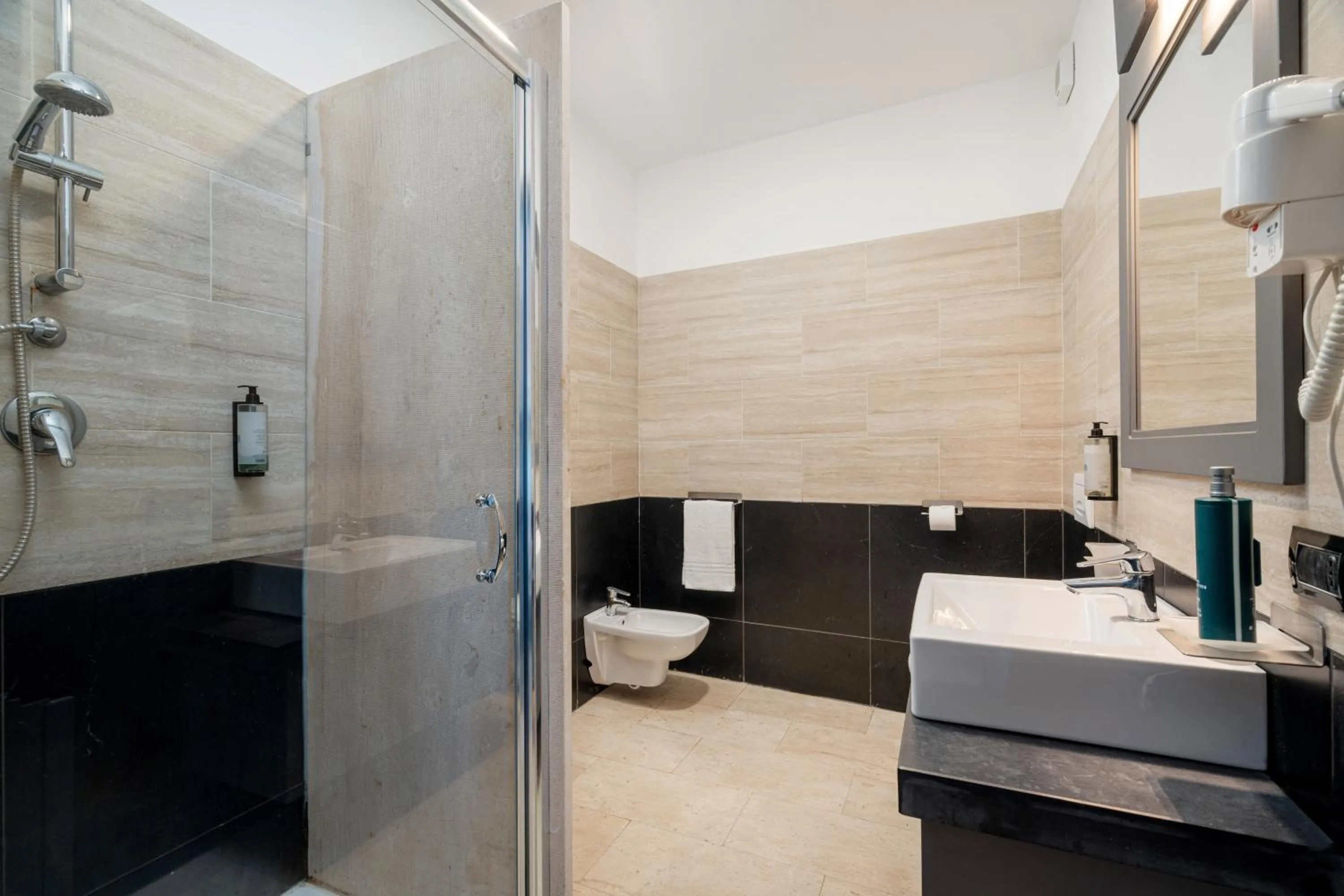 Shower in Bellevue Sardinia Resort Affiliated by Meliá