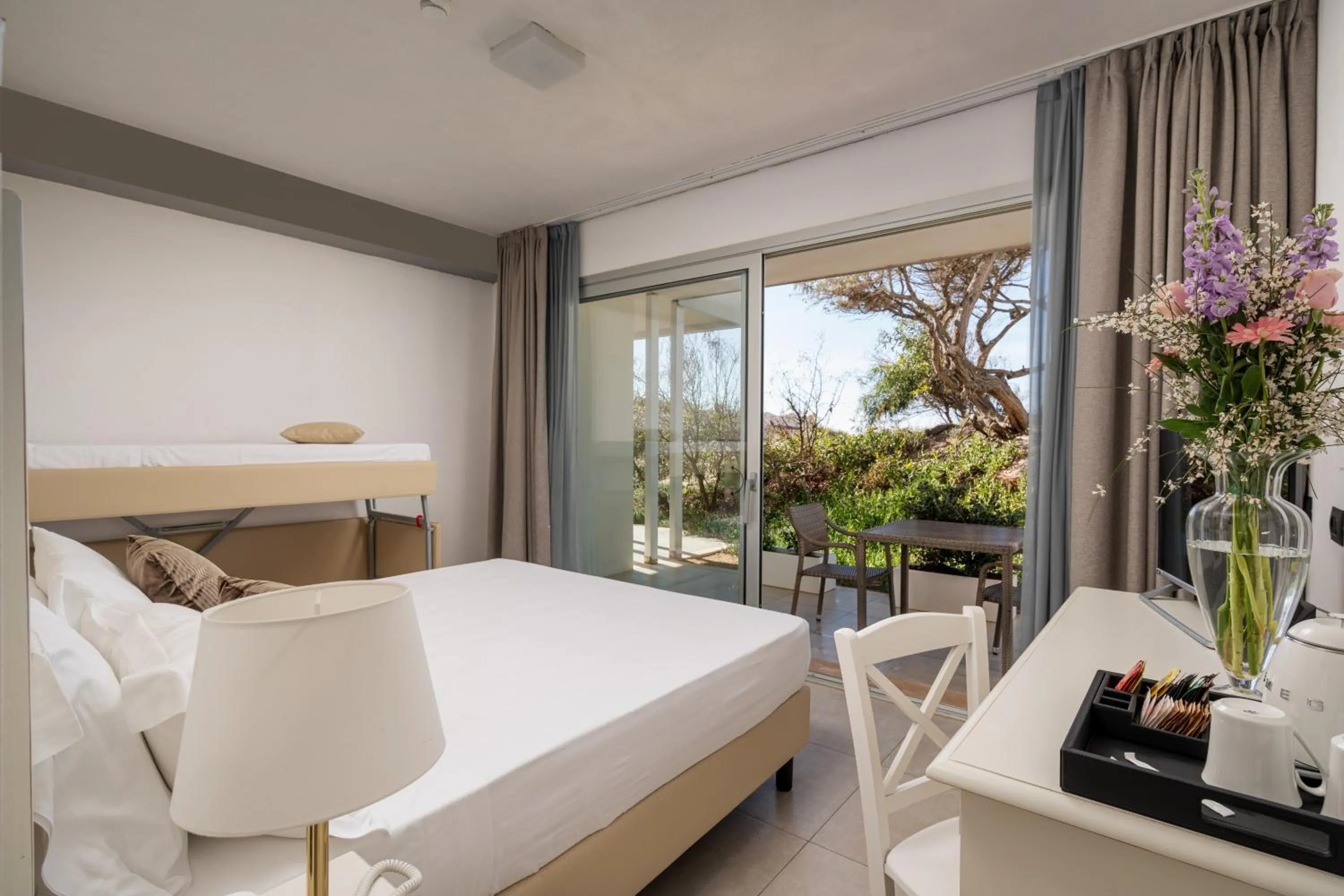 Bed in Bellevue Sardinia Resort Affiliated by Meliá