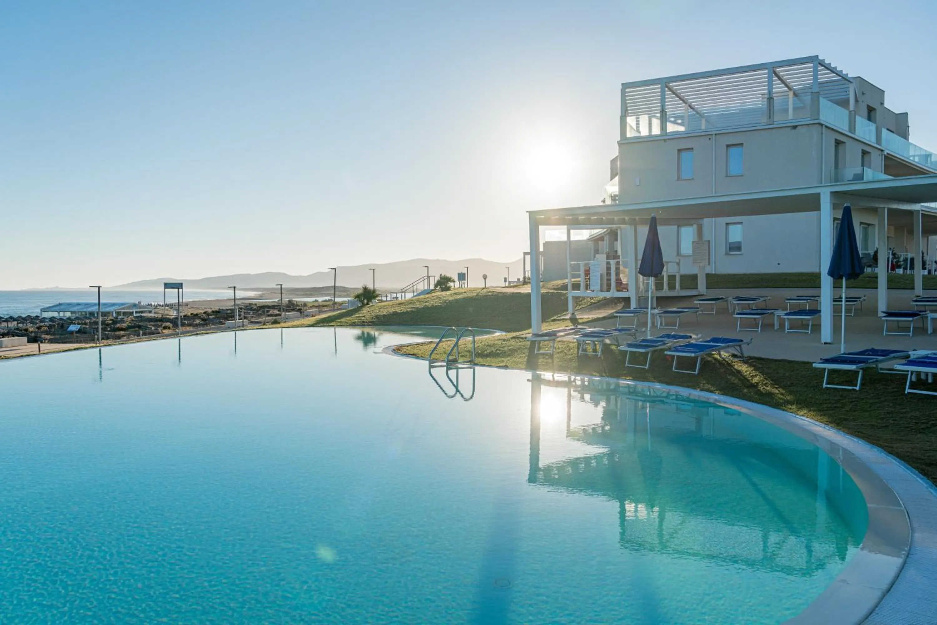 Swimming pool in Bellevue Sardinia Resort Affiliated by Meliá