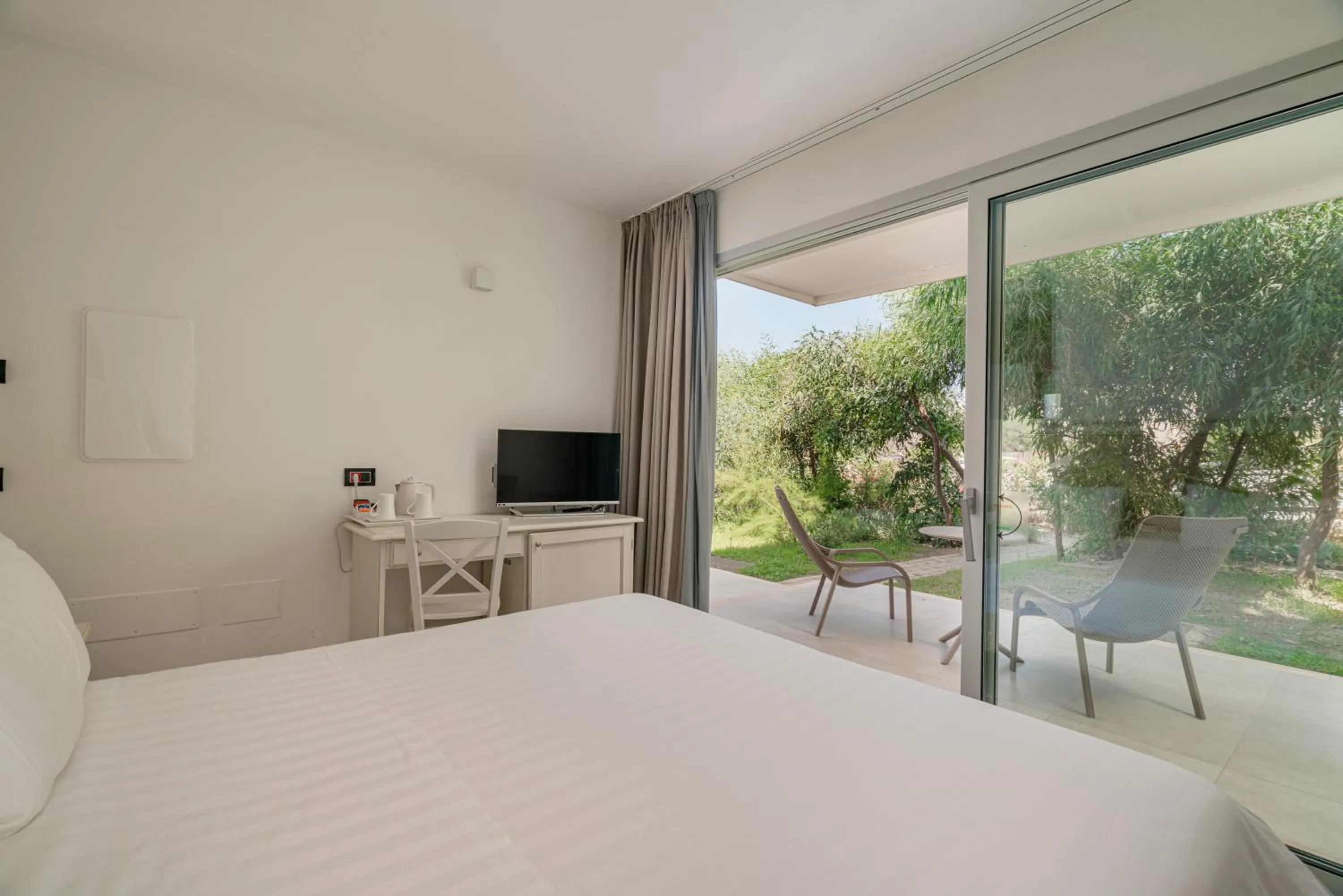 Bed in Bellevue Sardinia Resort Affiliated by Meliá