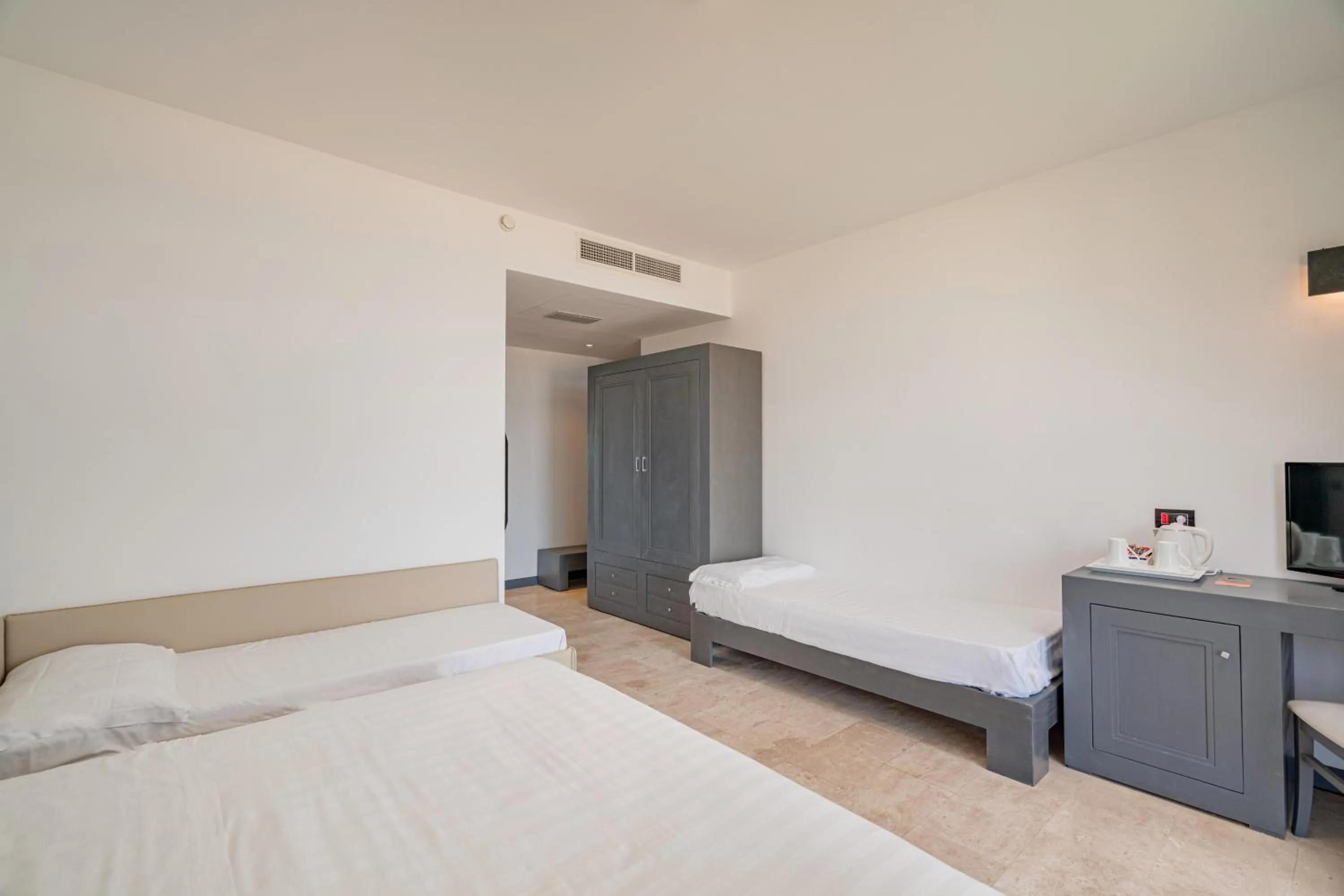 Bed in Bellevue Sardinia Resort Affiliated by Meliá