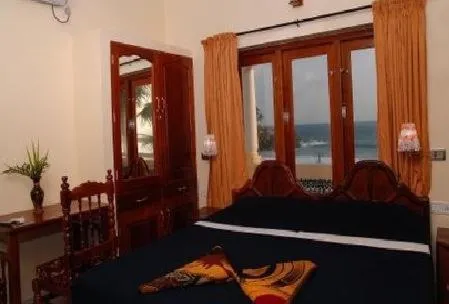 Photo of the whole room, Bed in Beach Florra Inn