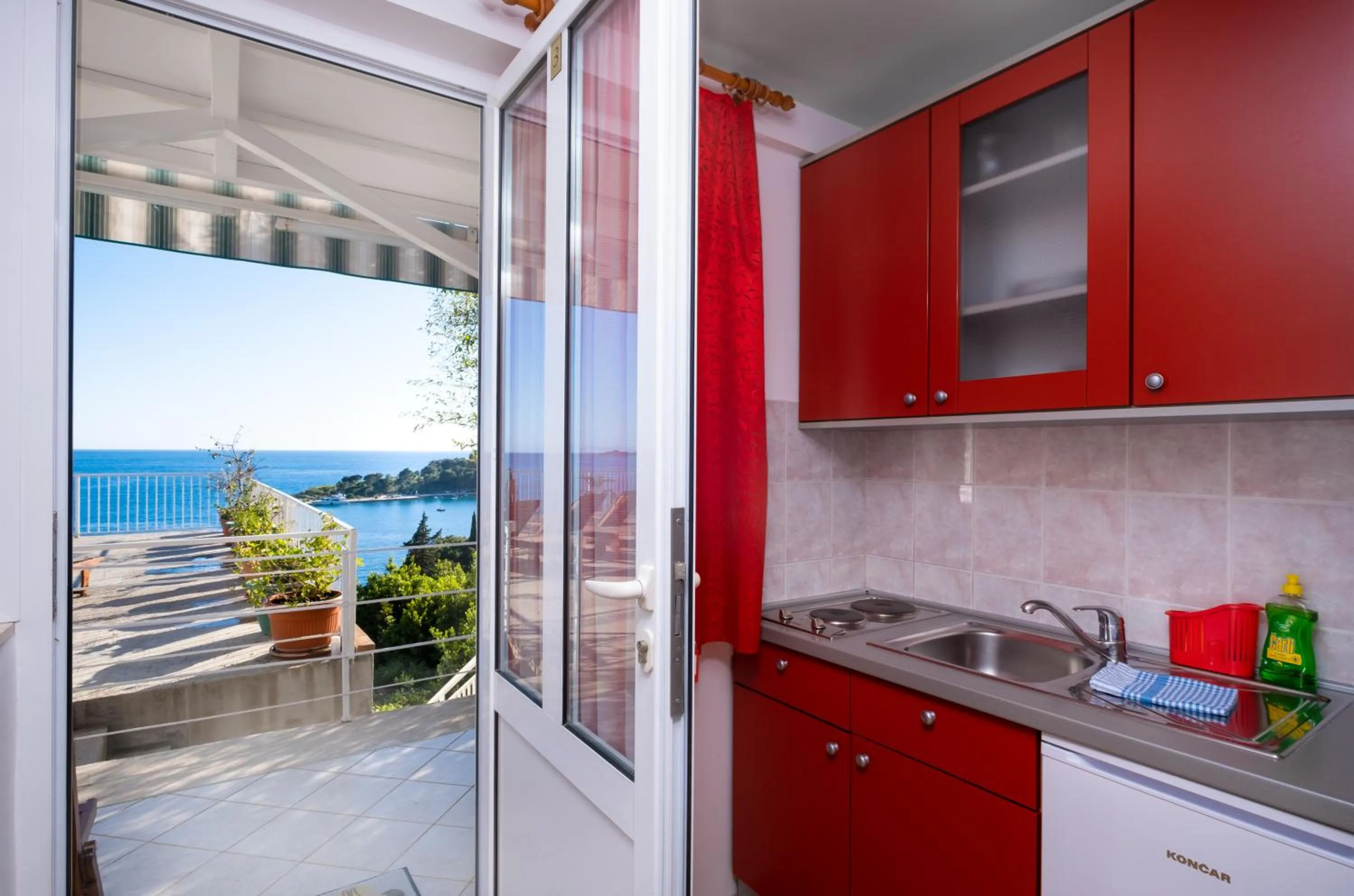 Kitchen or kitchenette in Apartments Katica