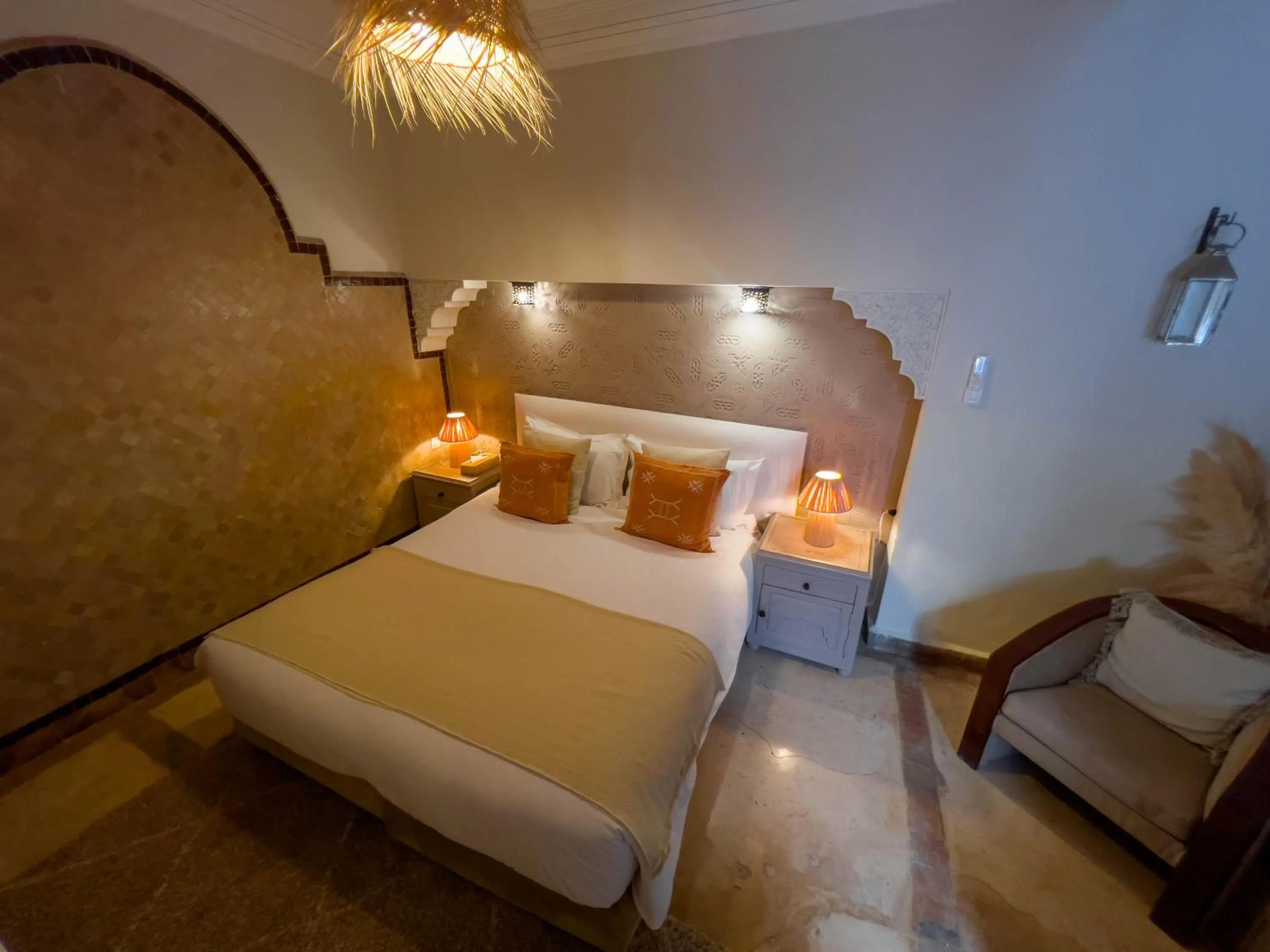 Seating area, Bed in Riad Jonan & Spa