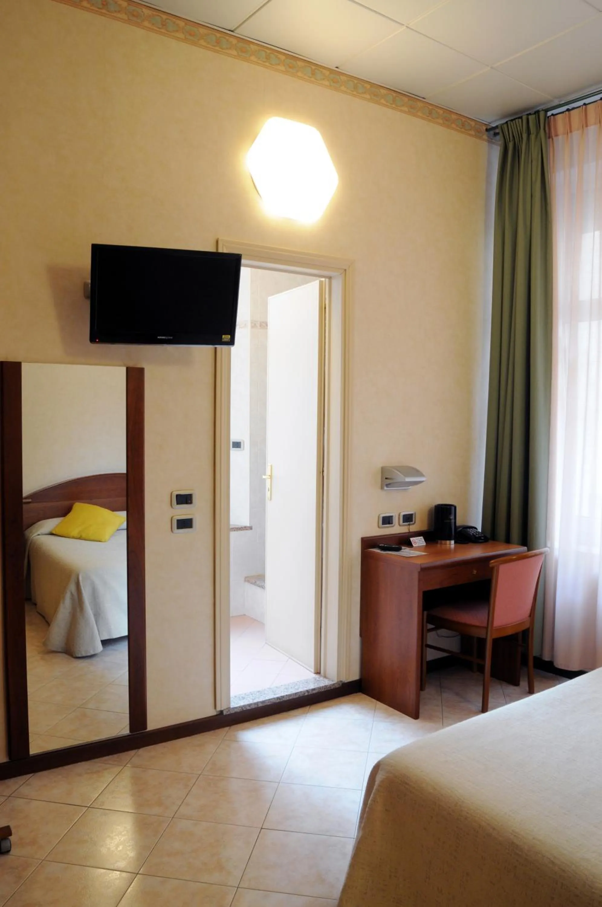 Photo of the whole room, Bed in Hotel Button