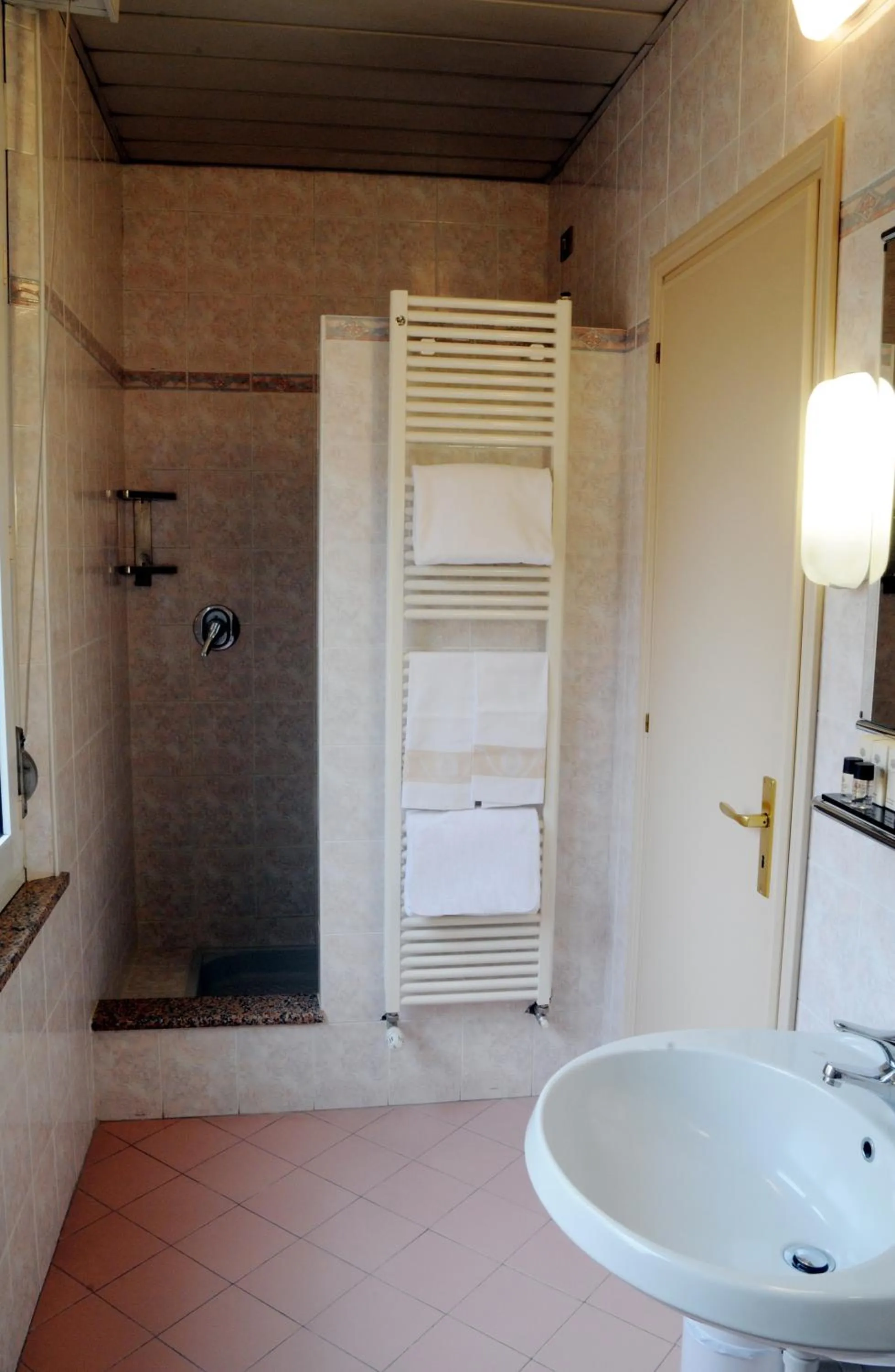 Bathroom in Hotel Button