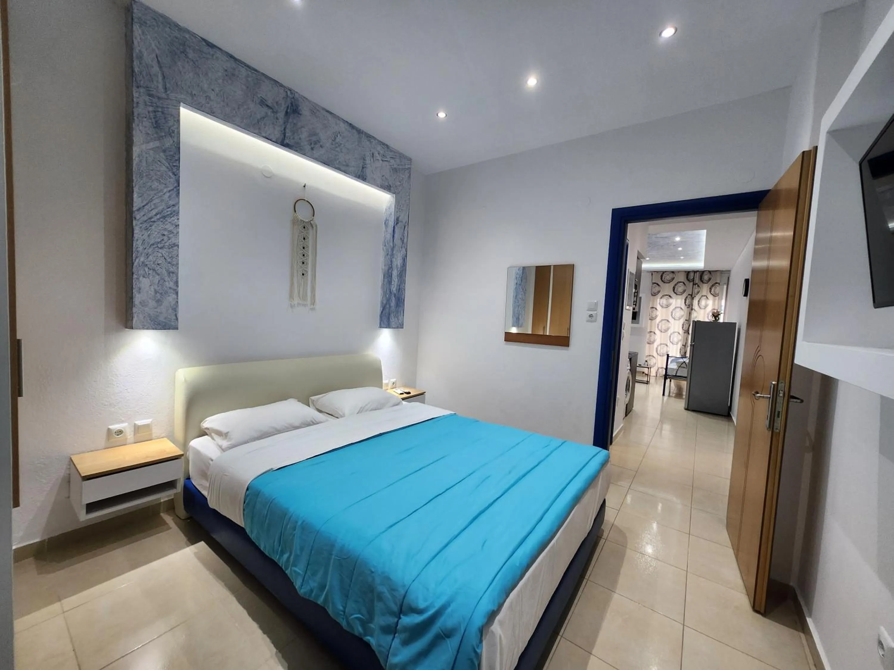 Bed in The Blue Beach Apartments