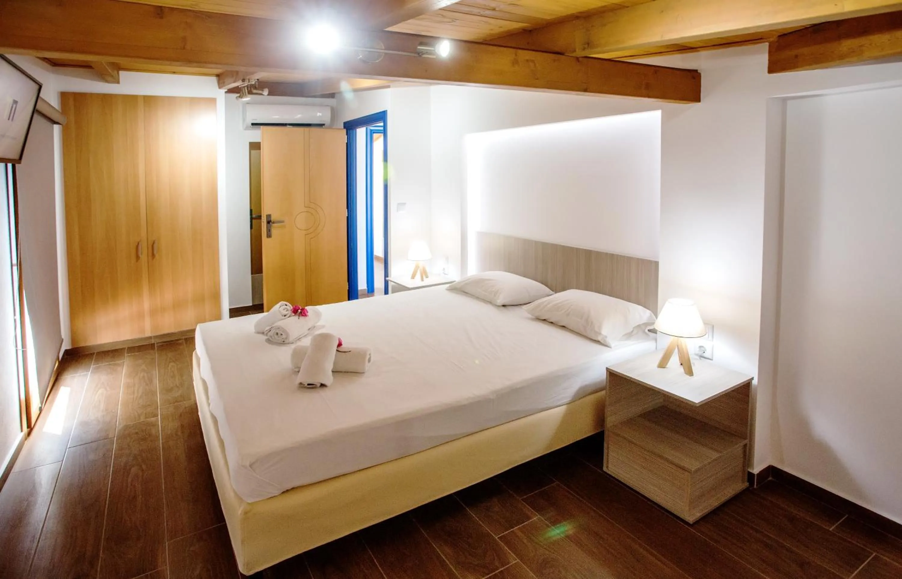 Bed in The Blue Beach Apartments