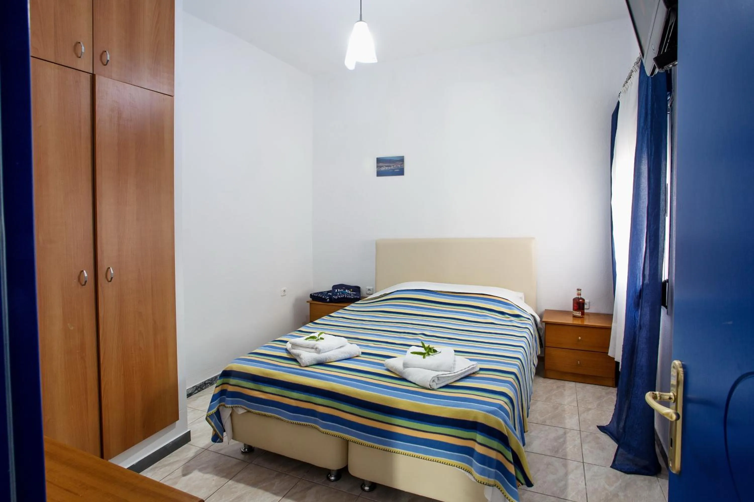 Bed in The Blue Beach Apartments